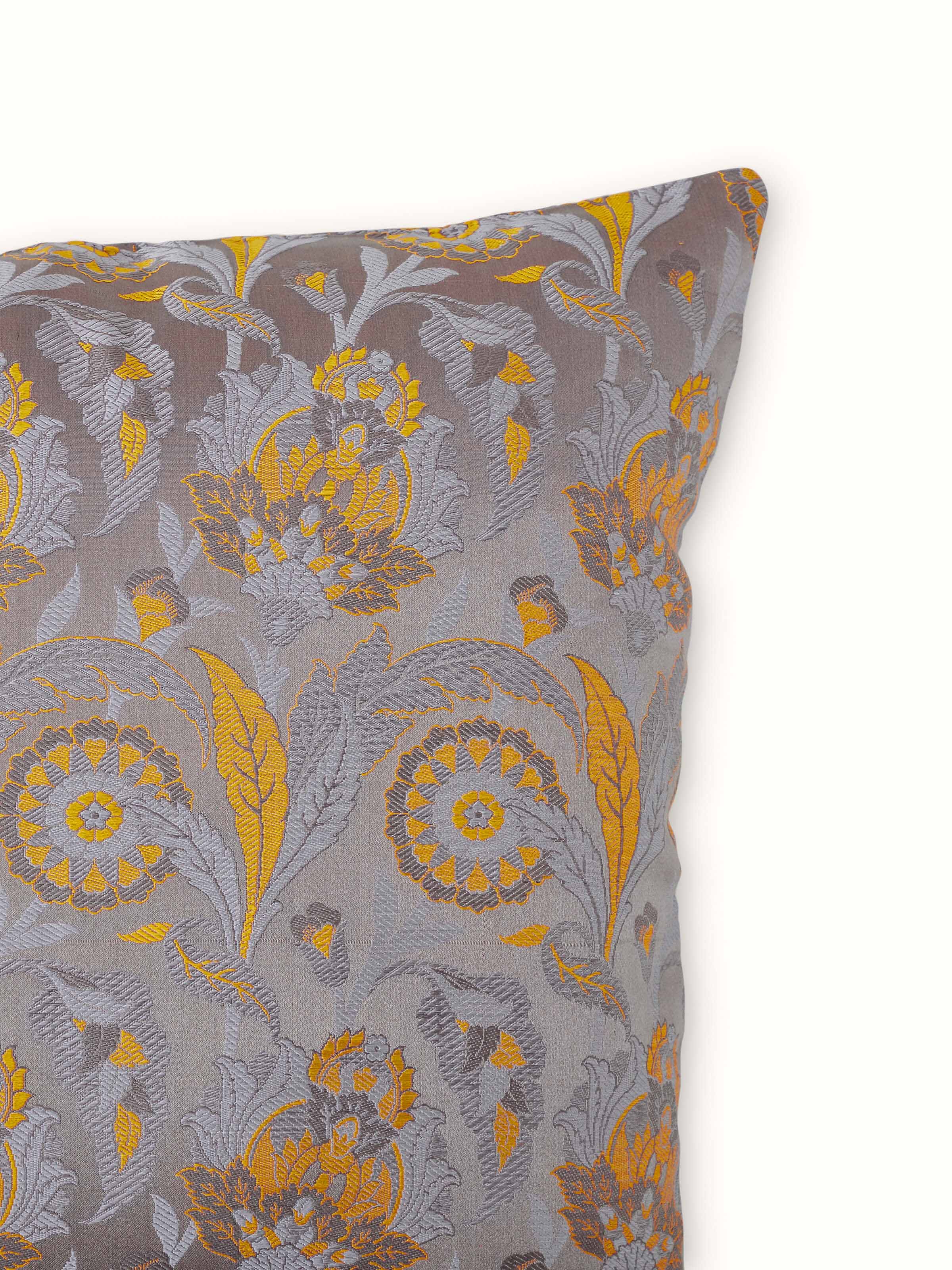 Detail shot highlighting floral motifs on Tanchoi Banarasi handloom cushion cover