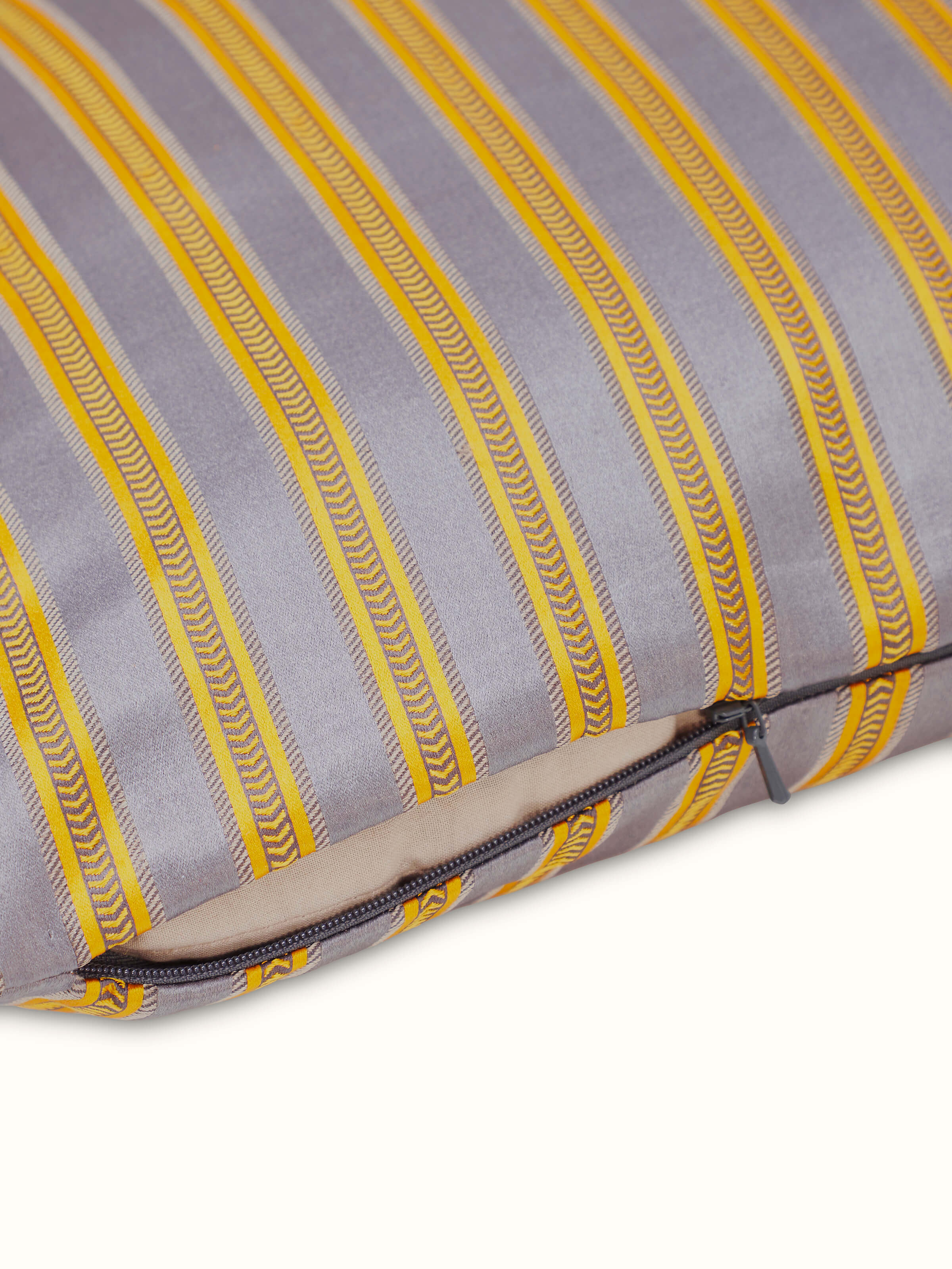 Close-up view of Aruni grey stripe silk mashru Banarasi handloom cushion cover, focusing on the silk fabric and stripe design.