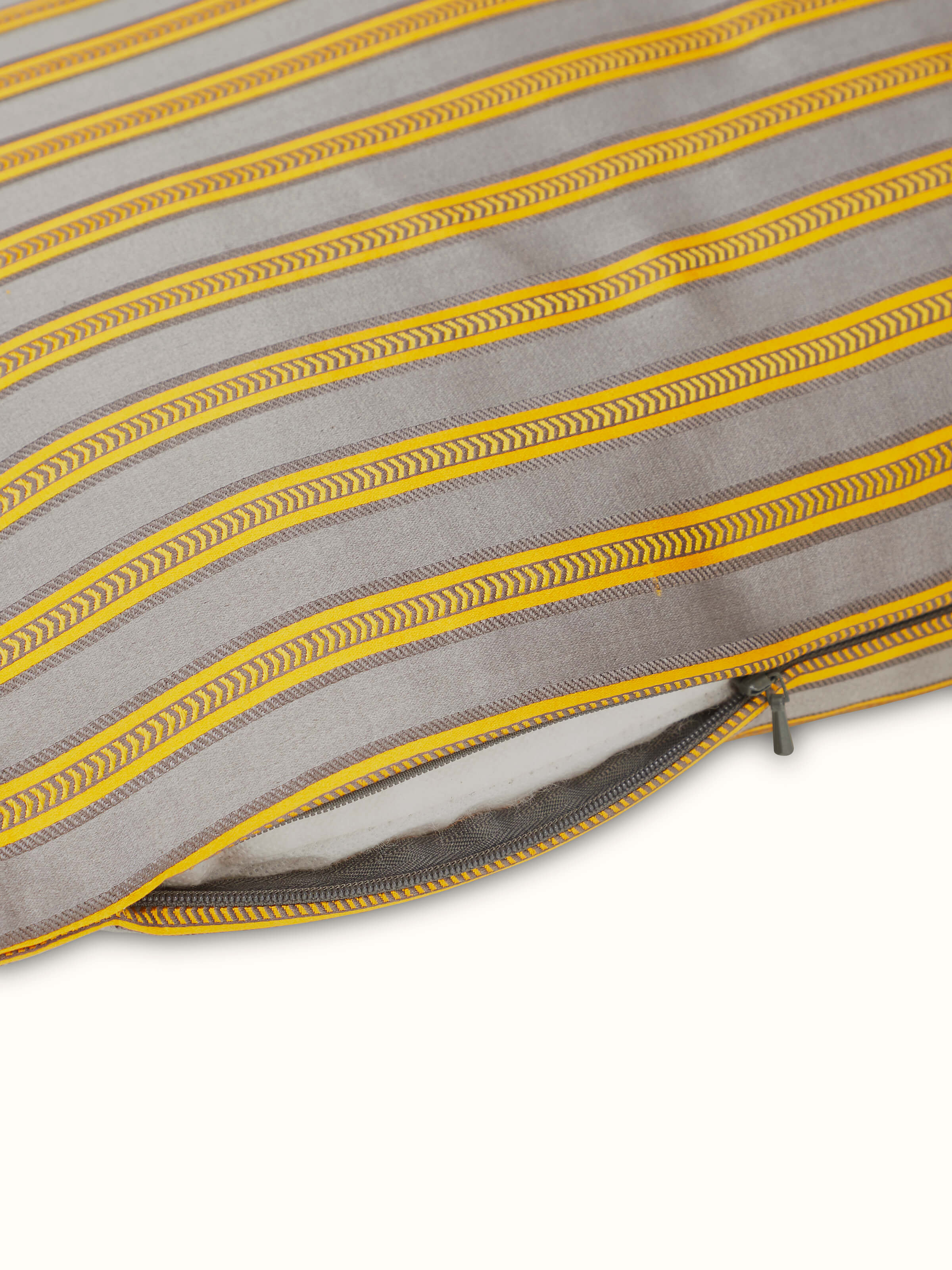 Detailed view of Aruni grey stripe silk mashru Banarasi handloom lumbar cushion cover showing its texture and weaving details.