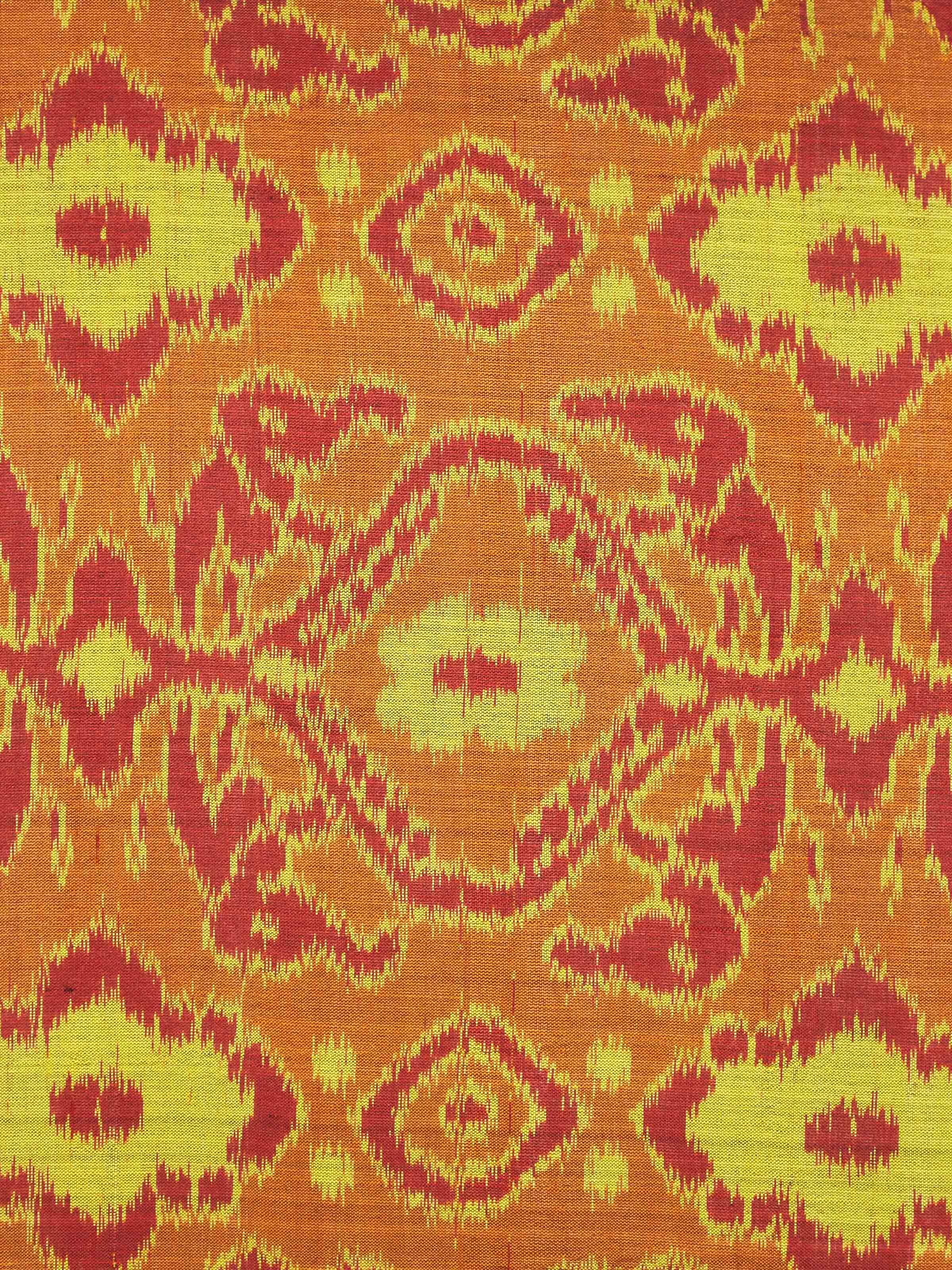Close-up of Bhoomi red allover silk Odisha handloom ikat cushion cover emphasizing the luxurious silk material and detailed ikat pattern