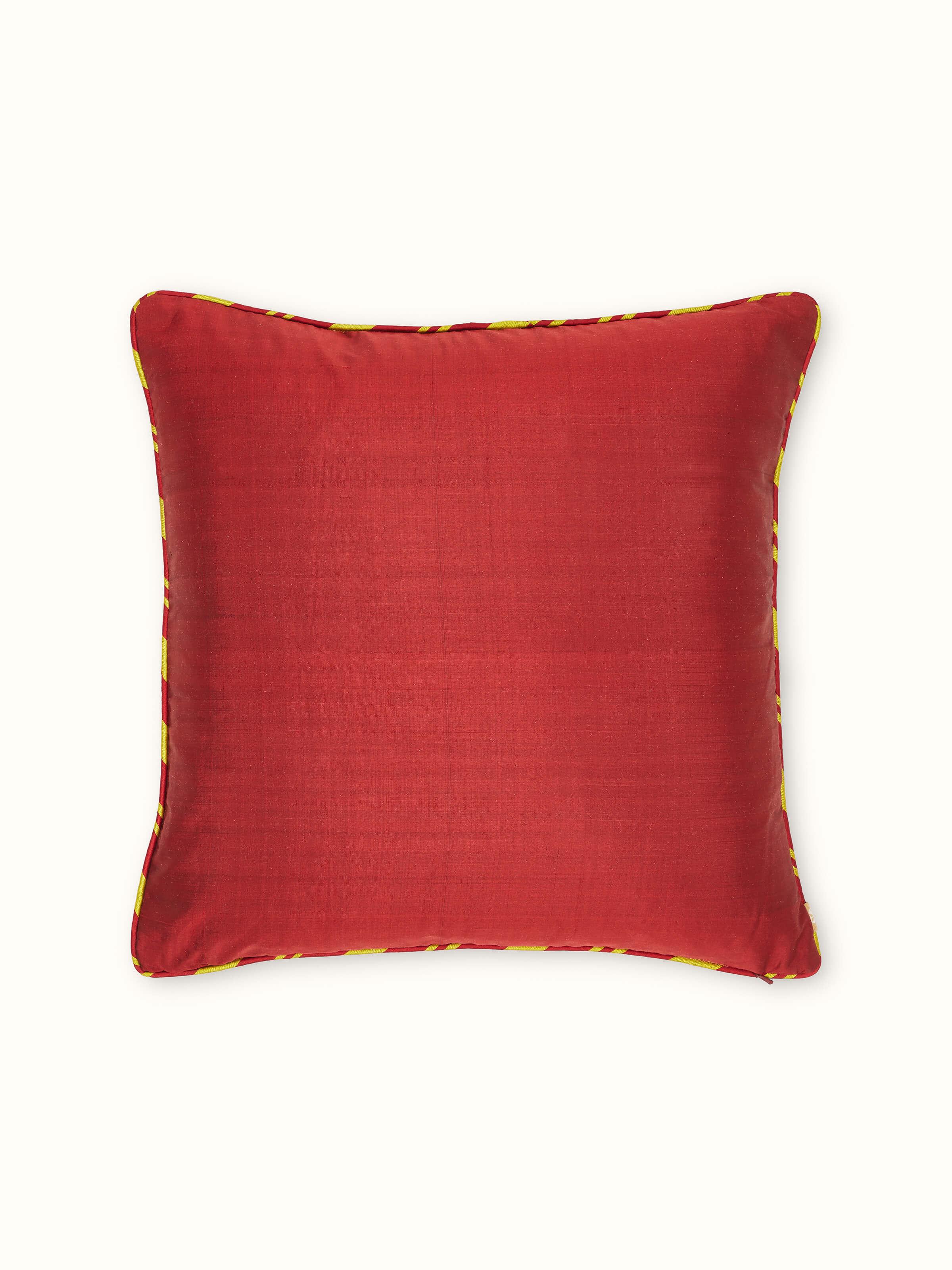 Detailed view of Bhoomi red allover silk Odisha handloom ikat cushion cover highlighting the unique ikat patterns and silk sheen