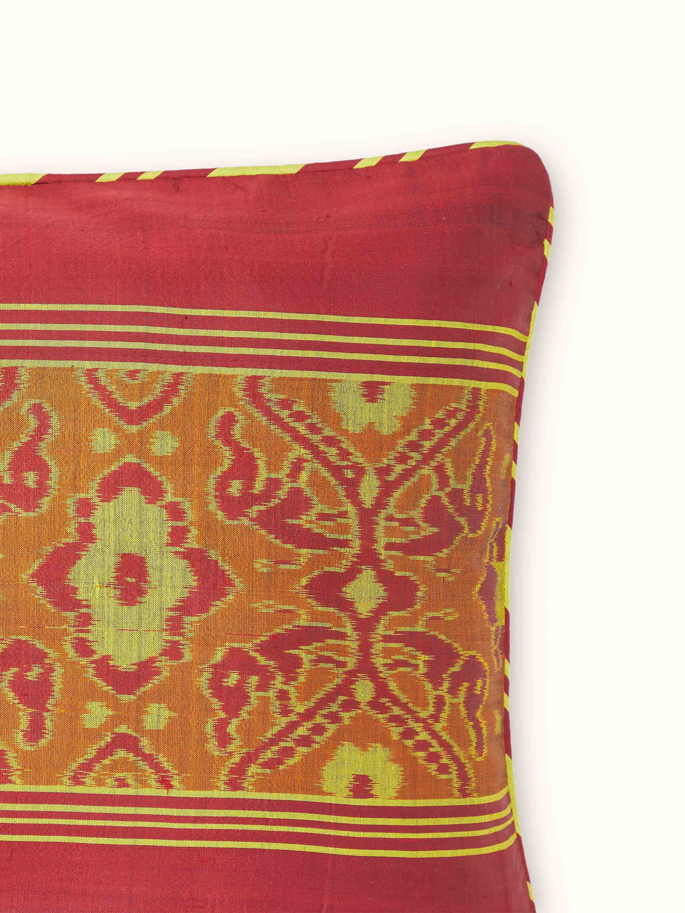 Detailed view of the Bhoomi Red Stripe Silk Odisha Handloom Ikat Cushion Cover, highlighting the texture and fabric quality.