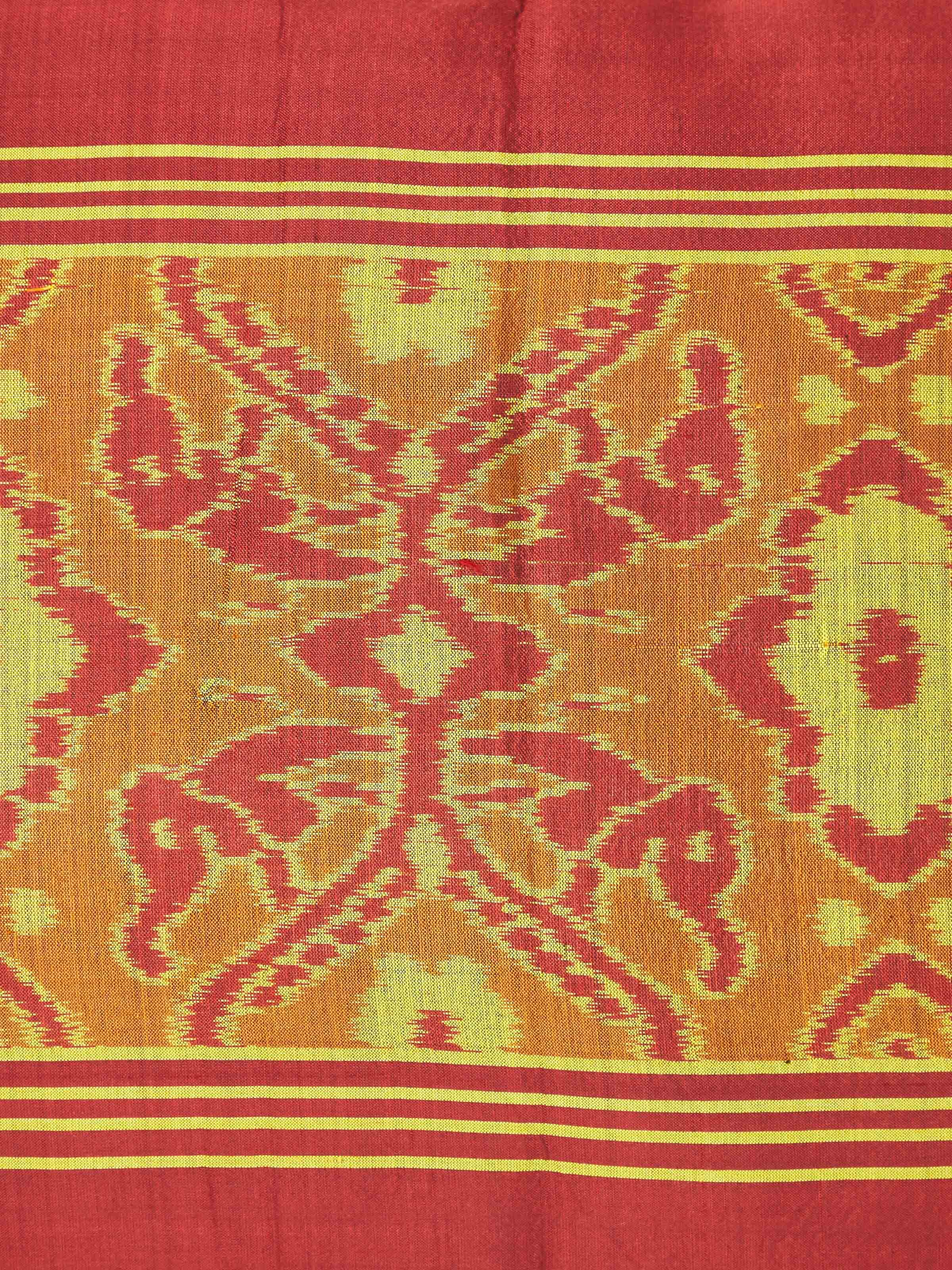 Side view of the Bhoomi Red Stripe Silk Odisha Handloom Ikat Cushion Cover, showing the cushion's depth and pattern alignment.
