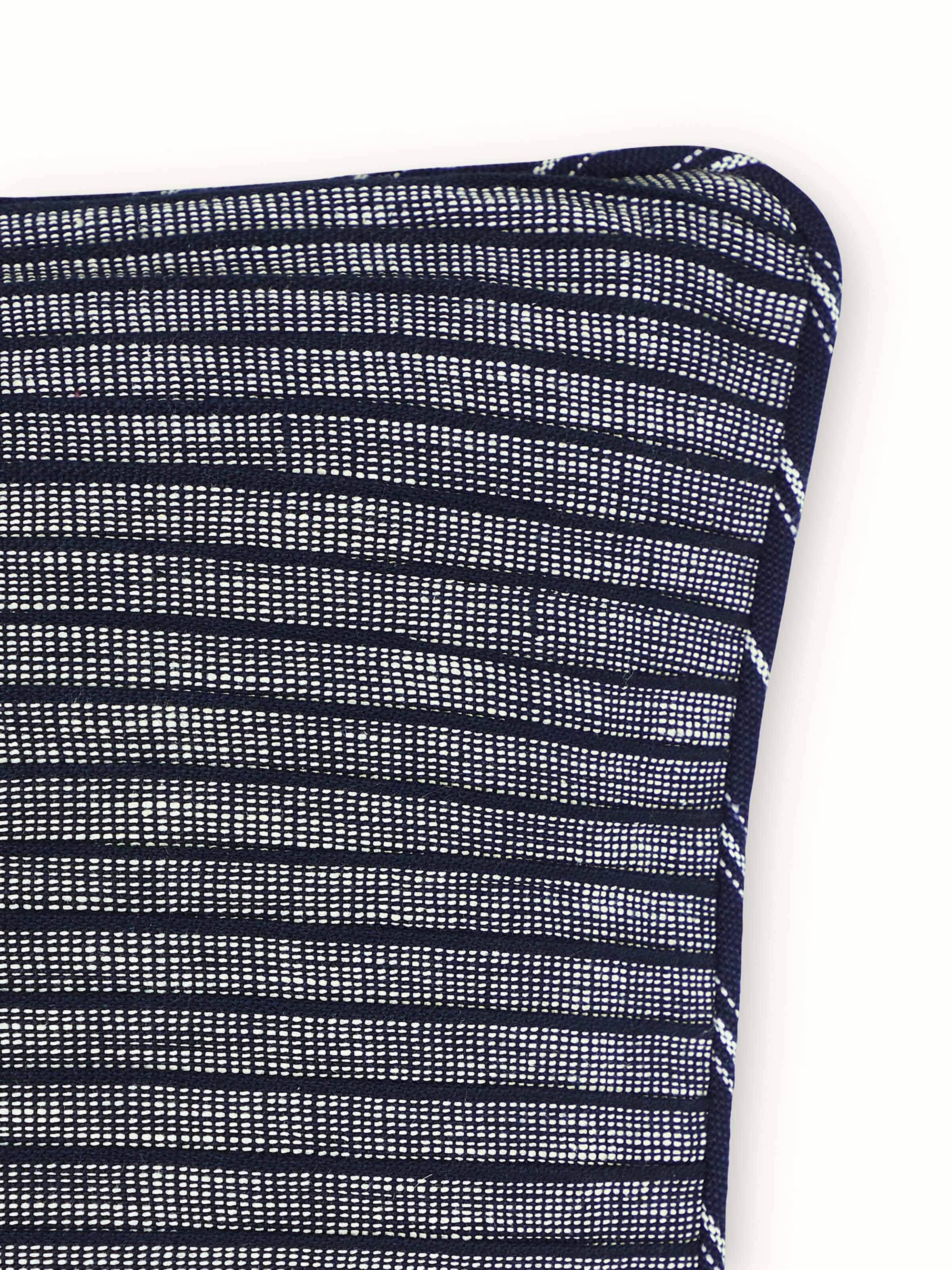 Detailed view of Krsna black Utpala cotton handloom cushion cover focusing on the intricate weave and fabric quality