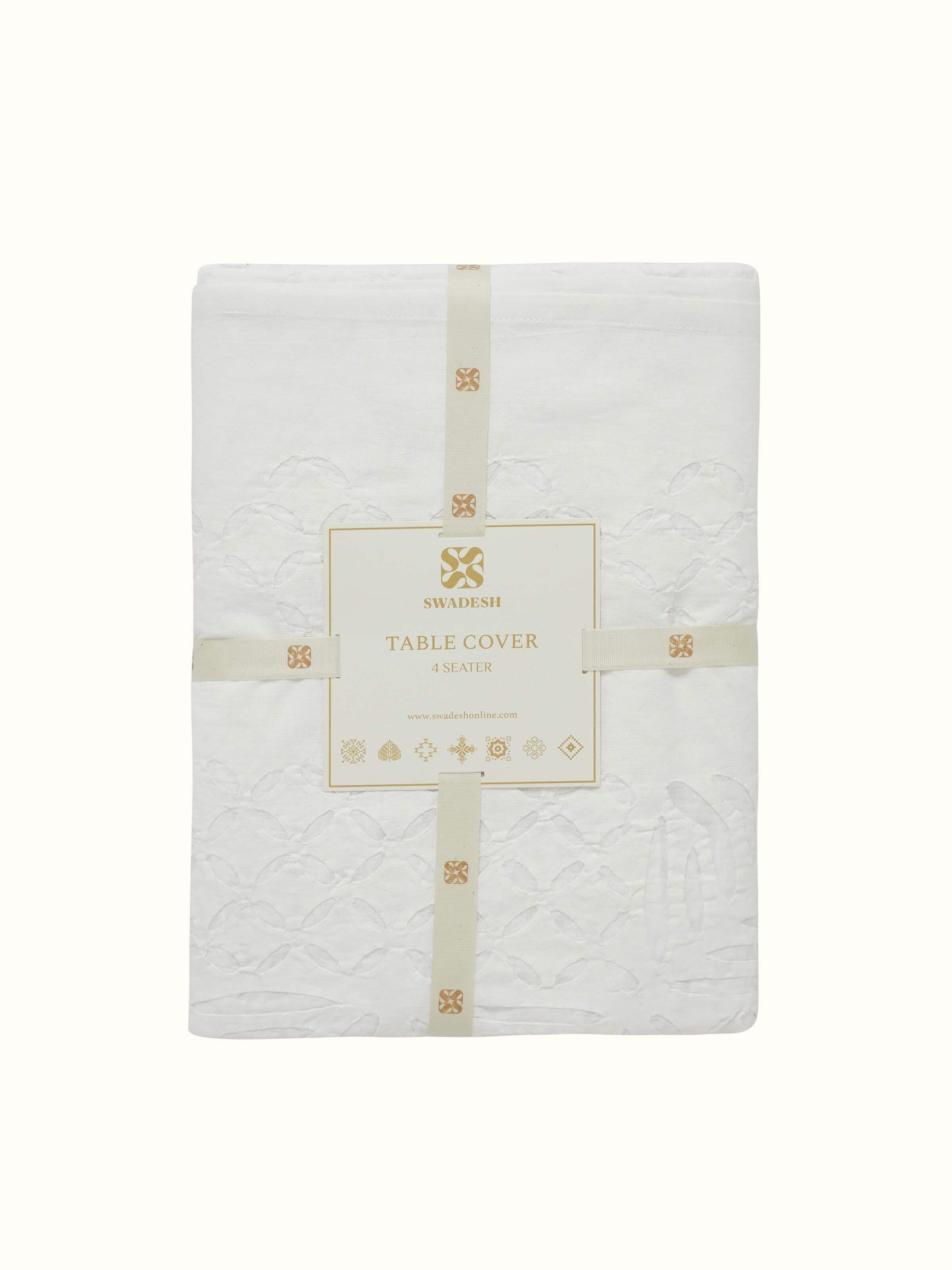 Ekam white trellis cotton appliqué embroidered table cover (4 seater) in a setting showing its use and design.