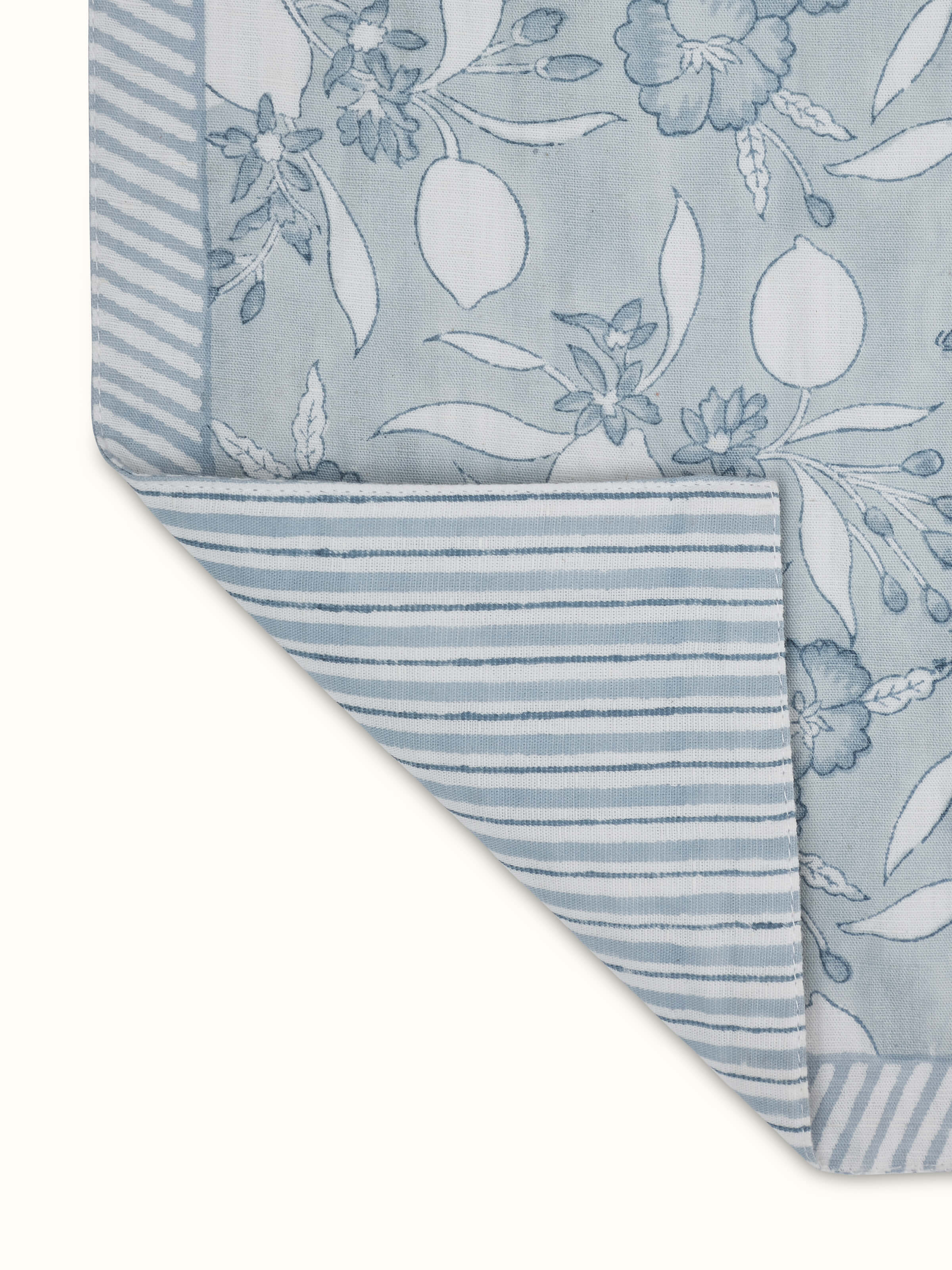 Back view of Anika light blue floral cotton linen Sanganeri block printed table runner (6 seater) showing the intricate block print
