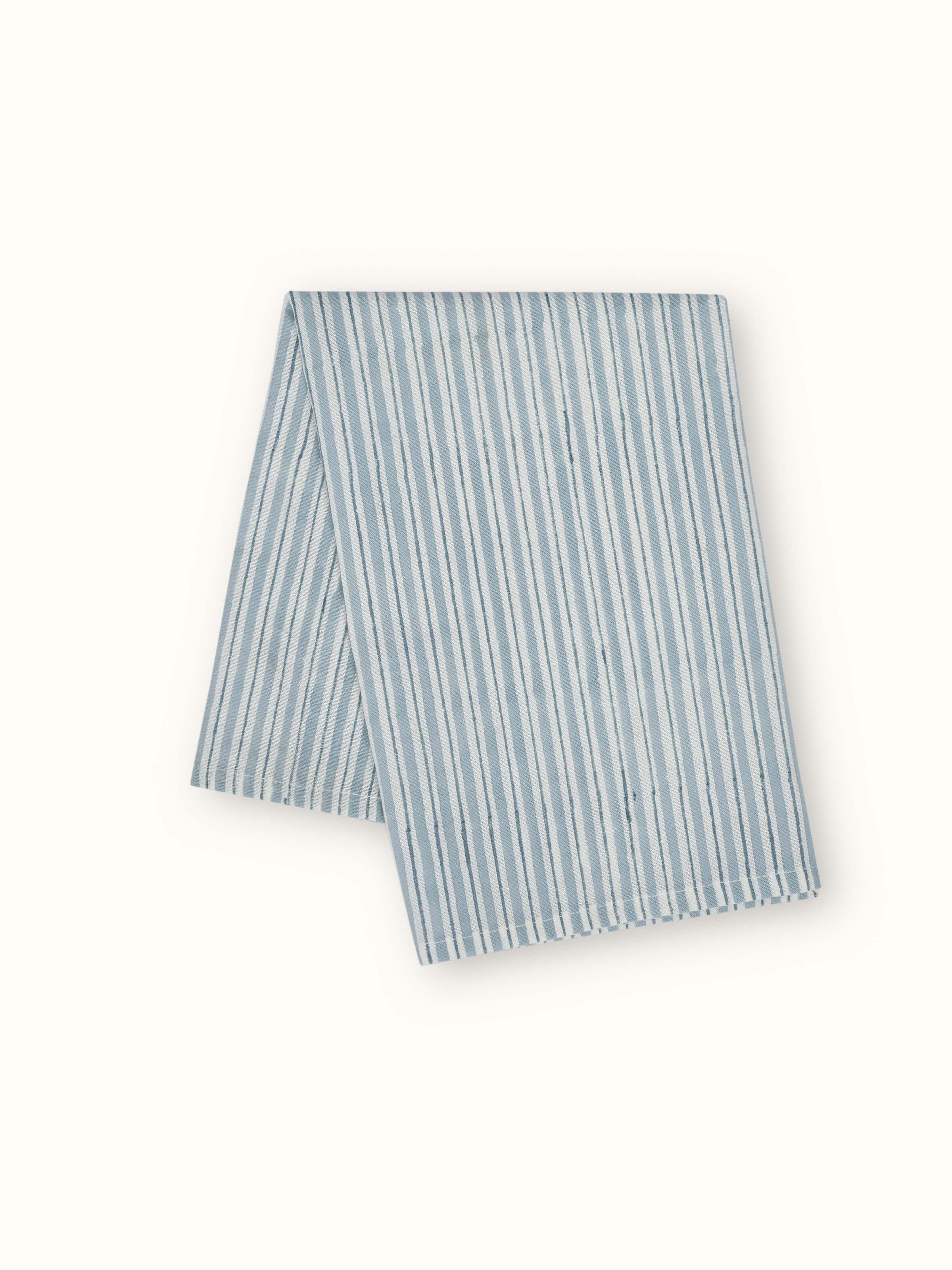 Side view of Anika Light Blue Stripe Cotton Linen Sanganeri Block Printed Dinner Napkins showing the thickness and quality of the linen material.