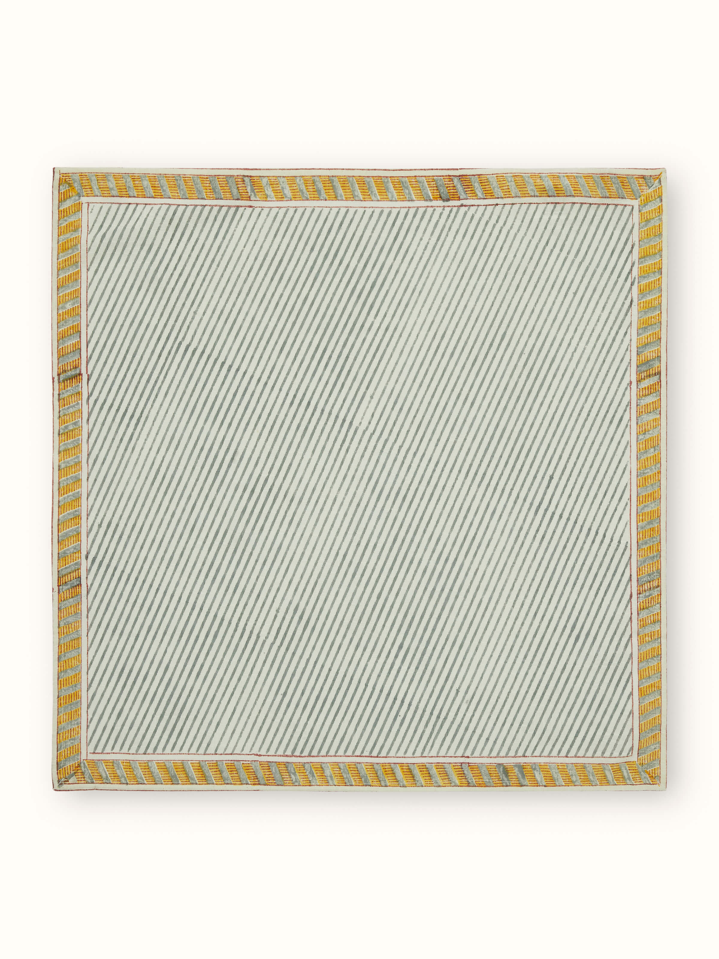 Close-up of Samaha twill grey stripe cotton Sanganeri block printed dinner napkins highlighting the block print details and stripe pattern.