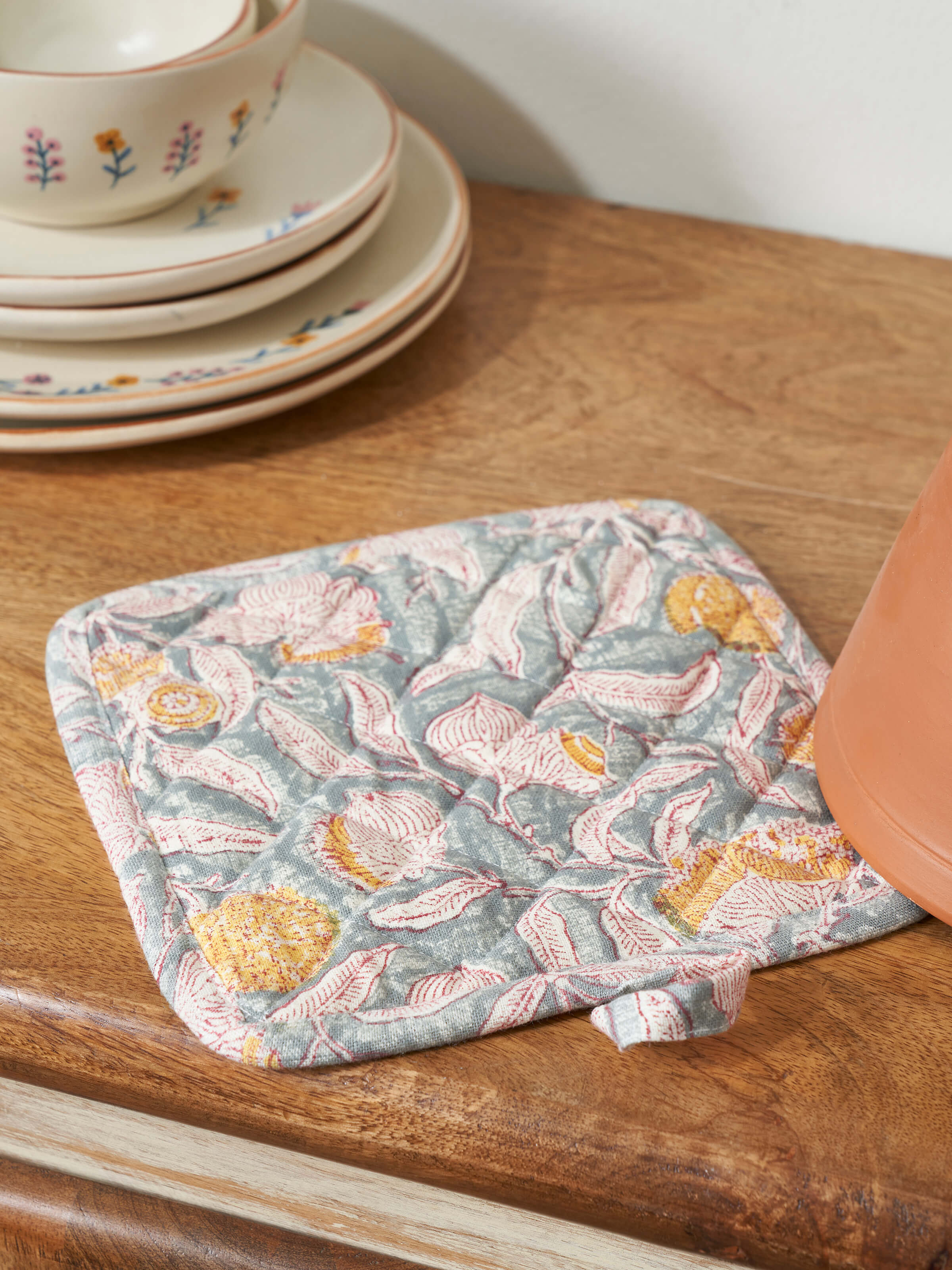 Close-up view of Samaha grey floral cotton Sanganeri block printed pot holder highlighting the floral block print design.