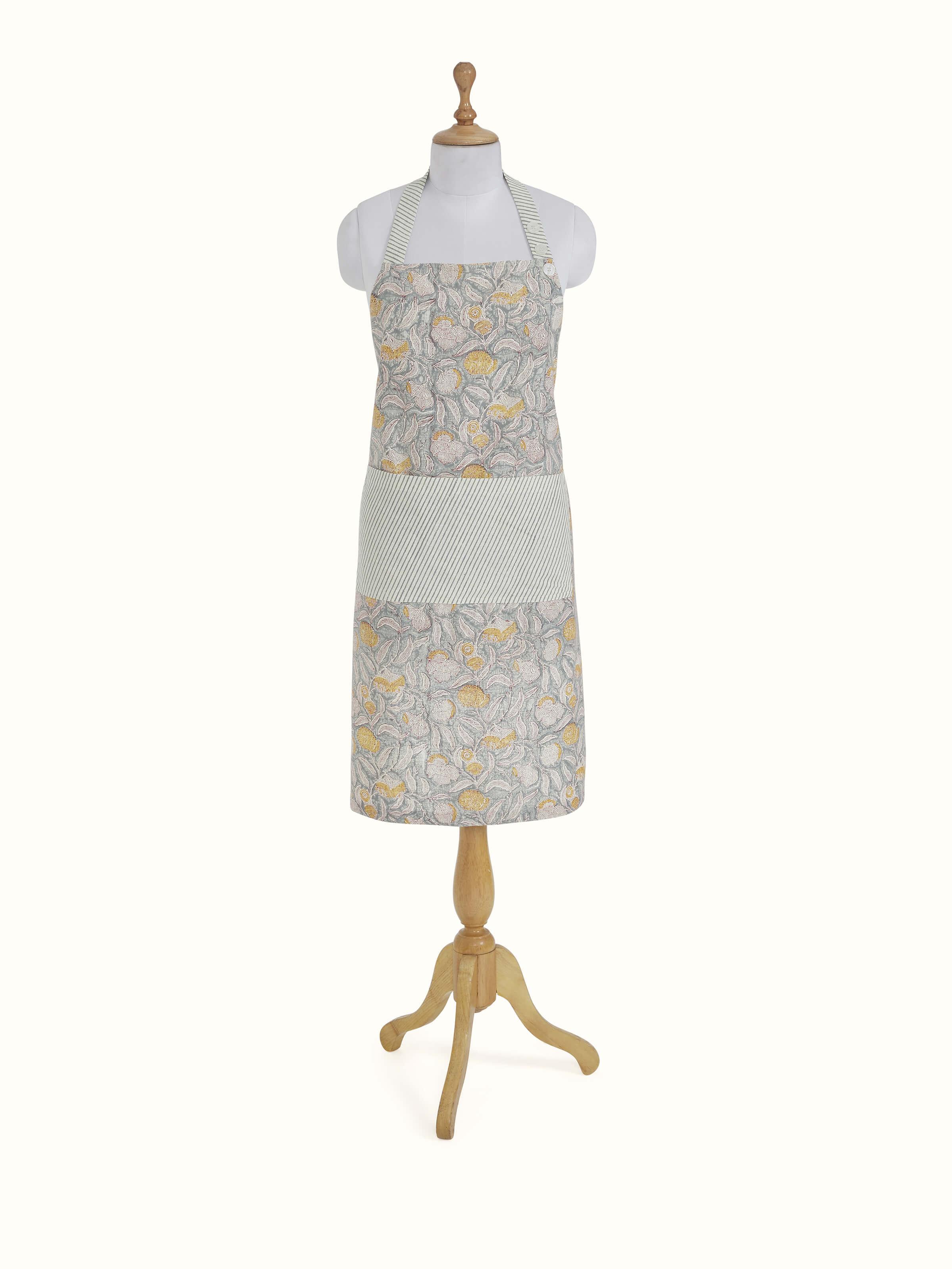 Front view of grey floral cotton Sanganeri block printed apron showcasing the floral block print and fabric texture.