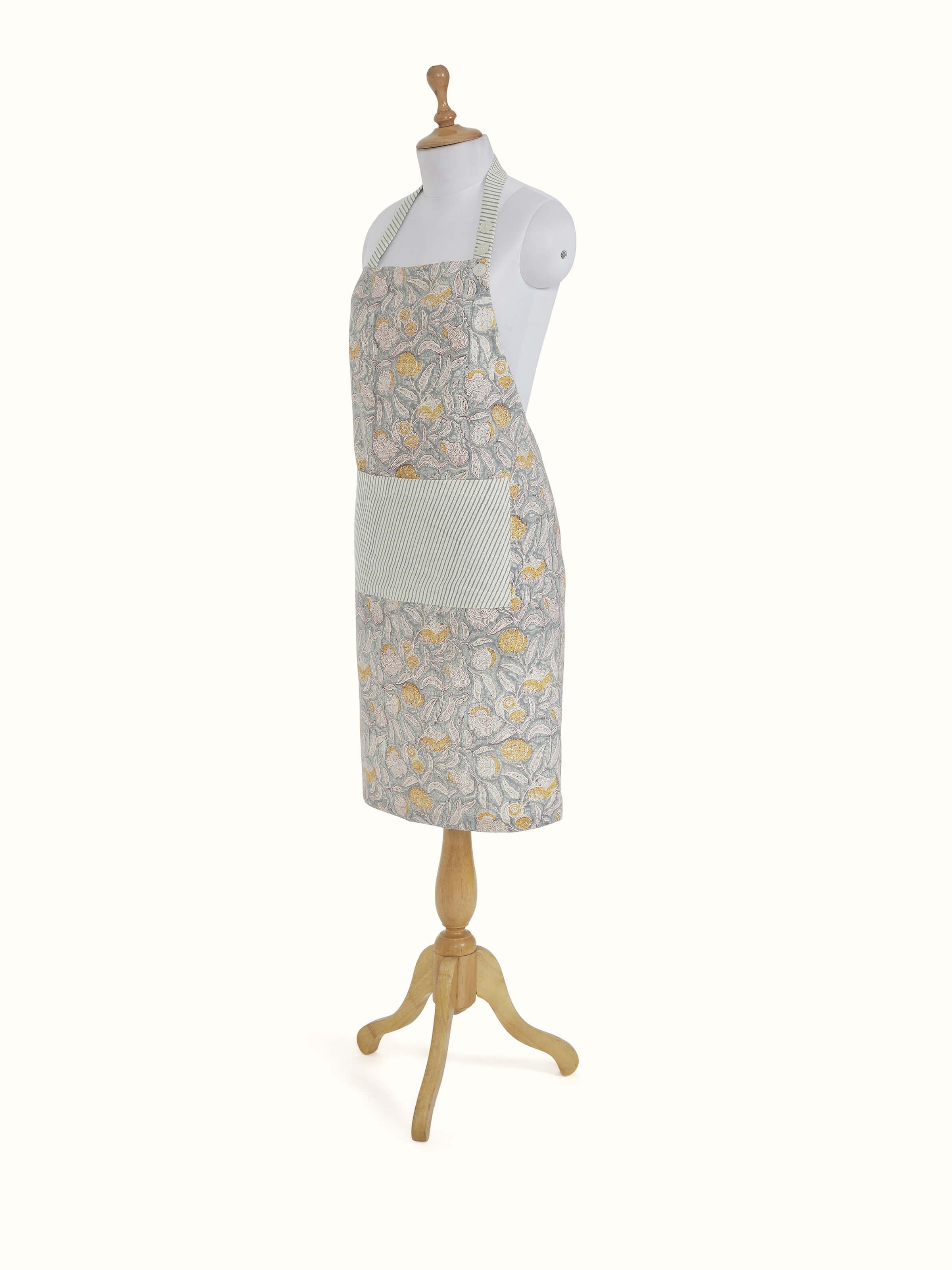 Detailed view of grey floral cotton Sanganeri block printed apron focusing on the intricate block print pattern.