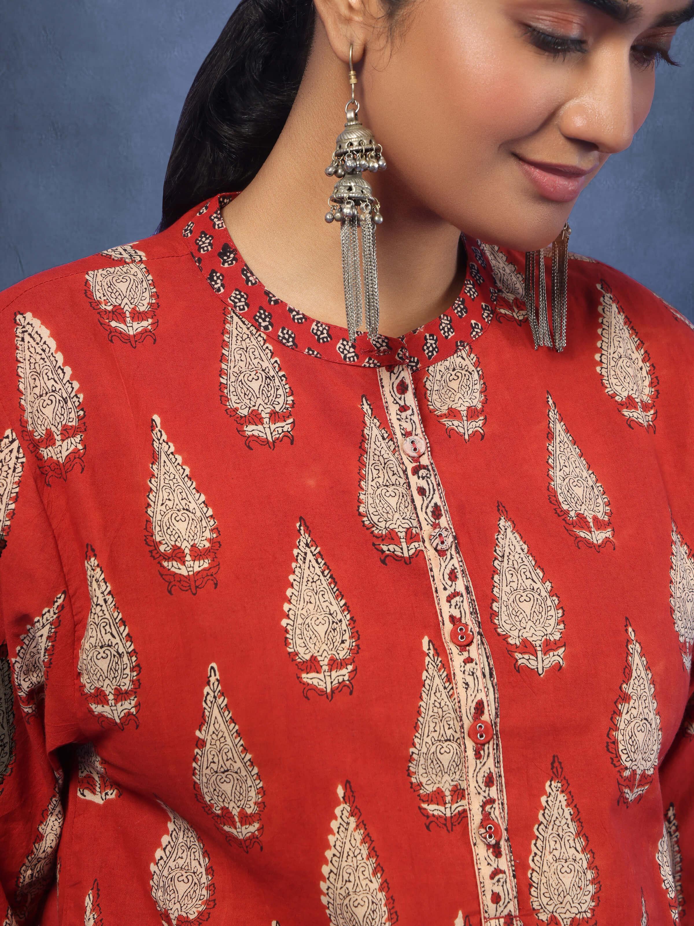 Detail shot highlighting neck pleats and floral Bagru prints.