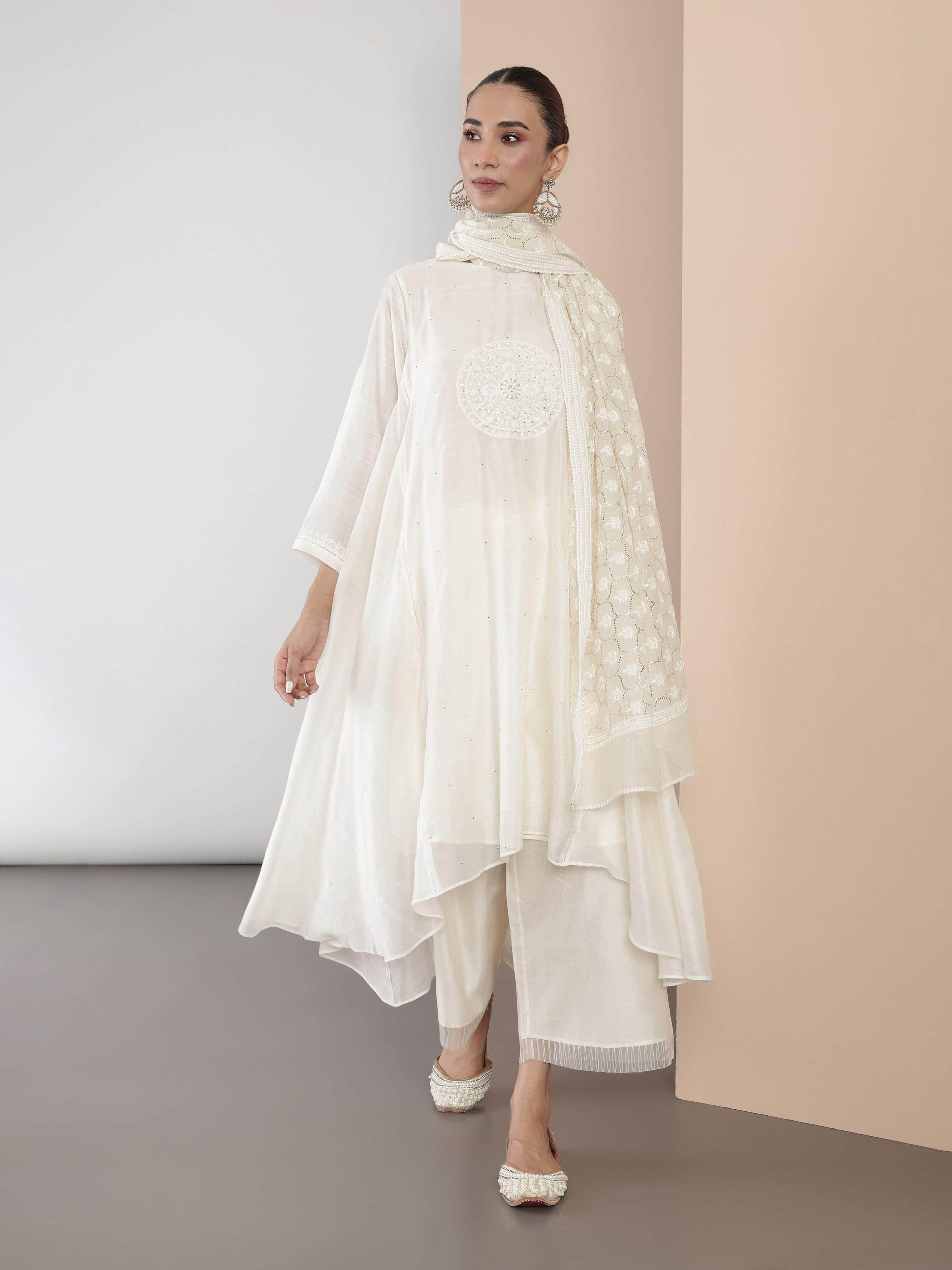 Another lifestyle angle highlighting the delicate chikankari work in natural lighting