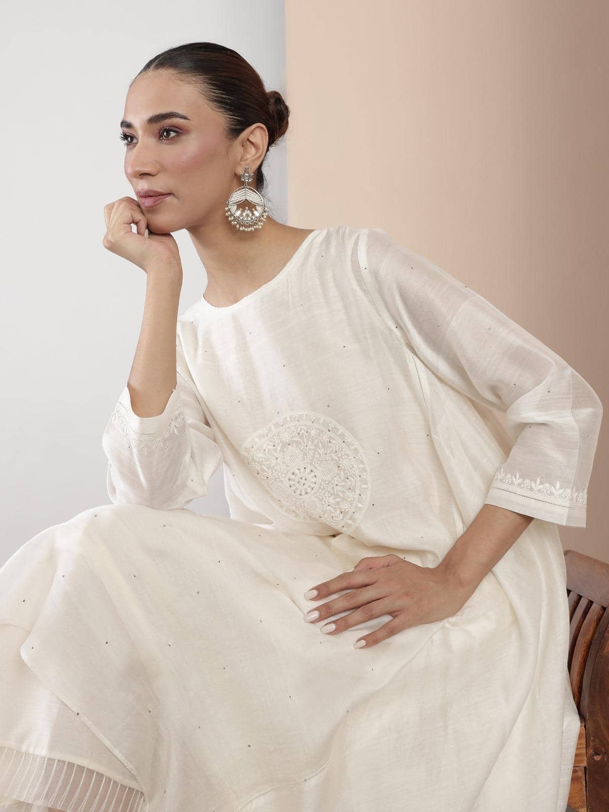 Side profile shot emphasizing the fit and elegant silhouette of the kurta
