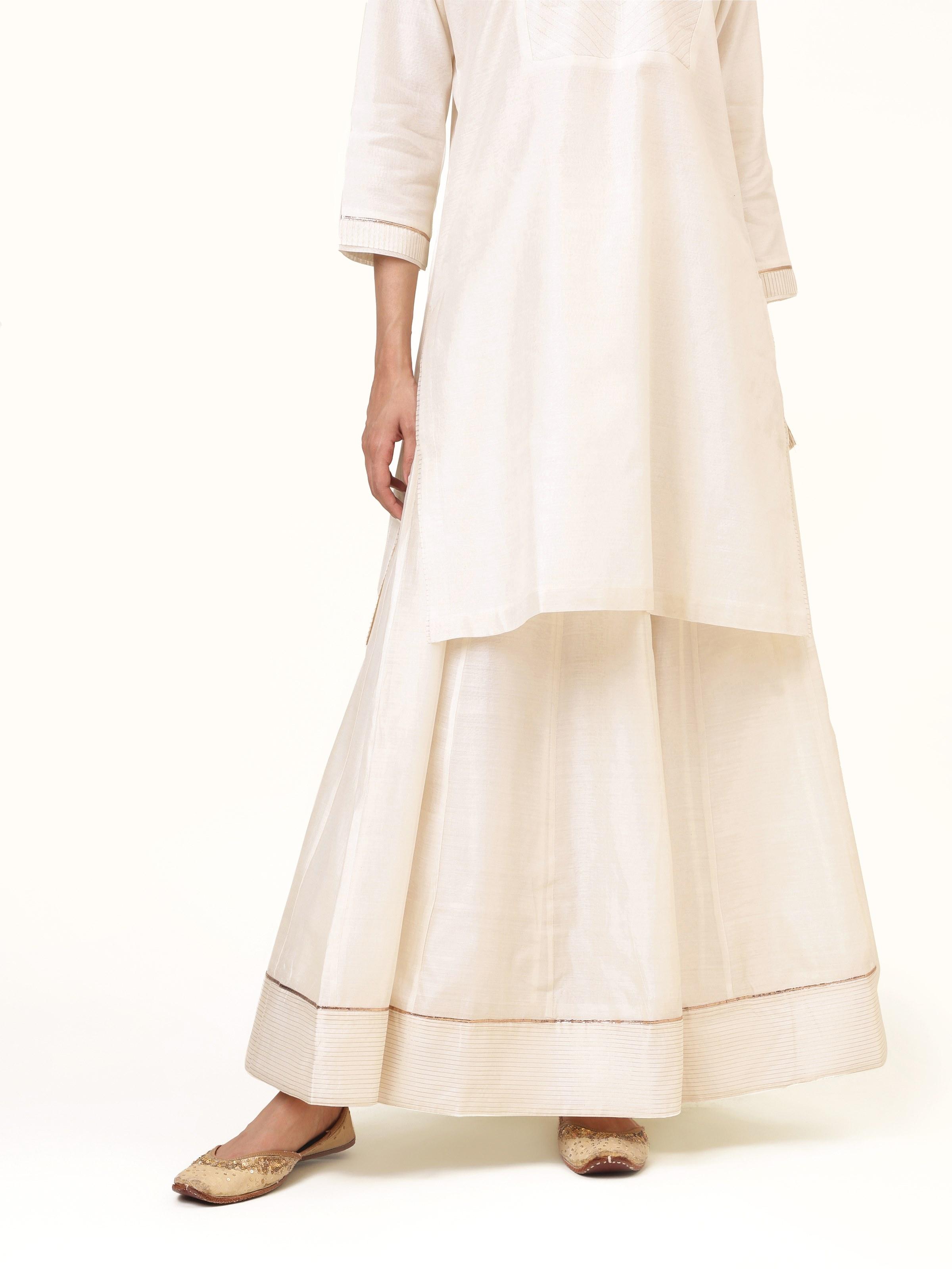 Front view showcasing the breezy flow and rich texture of the off-white cotton silk Chanderi skirt.