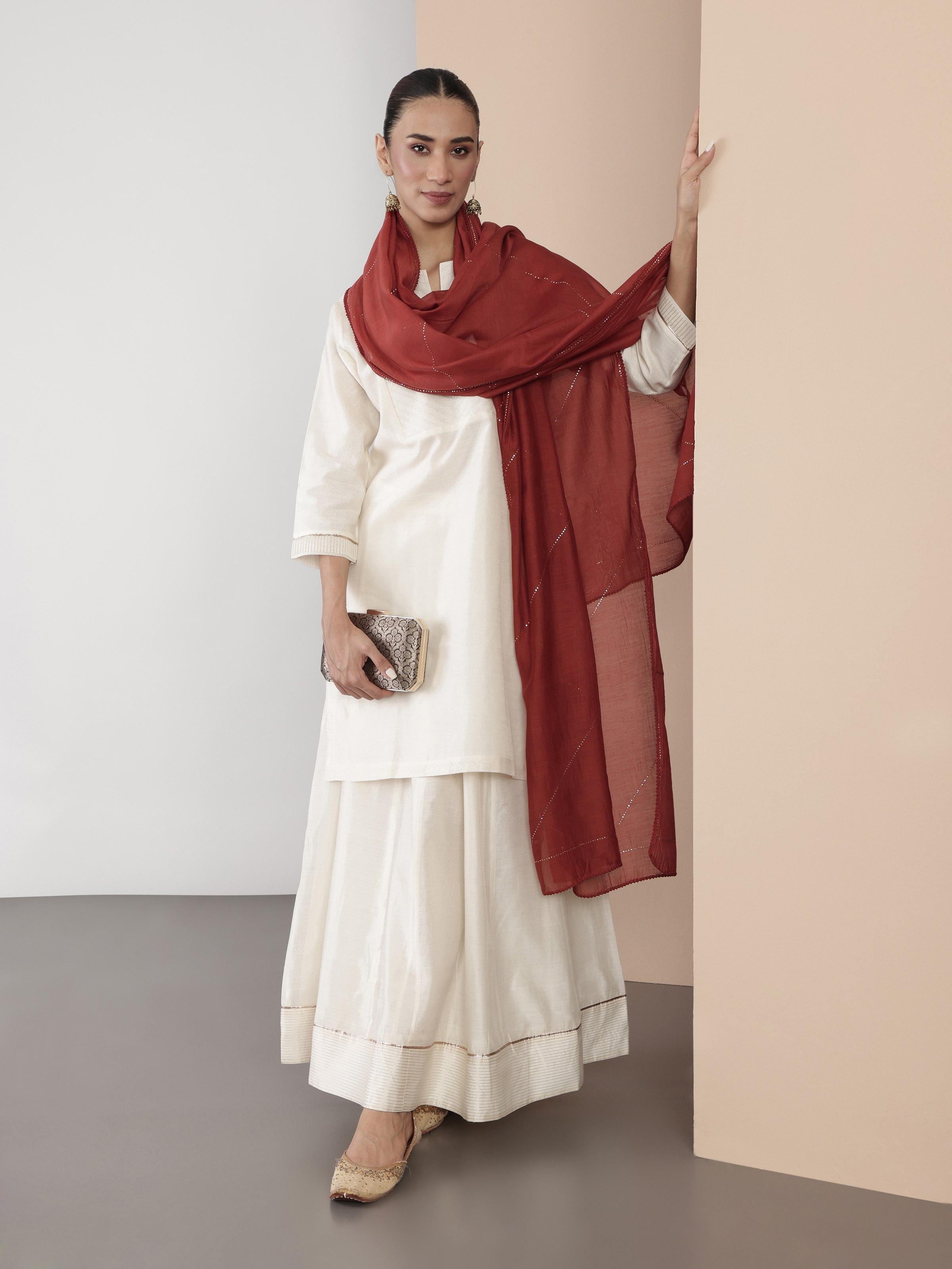 Lifestyle shot emphasizing the versatile elegance and subtle sheen of this Kalidar silhouette.