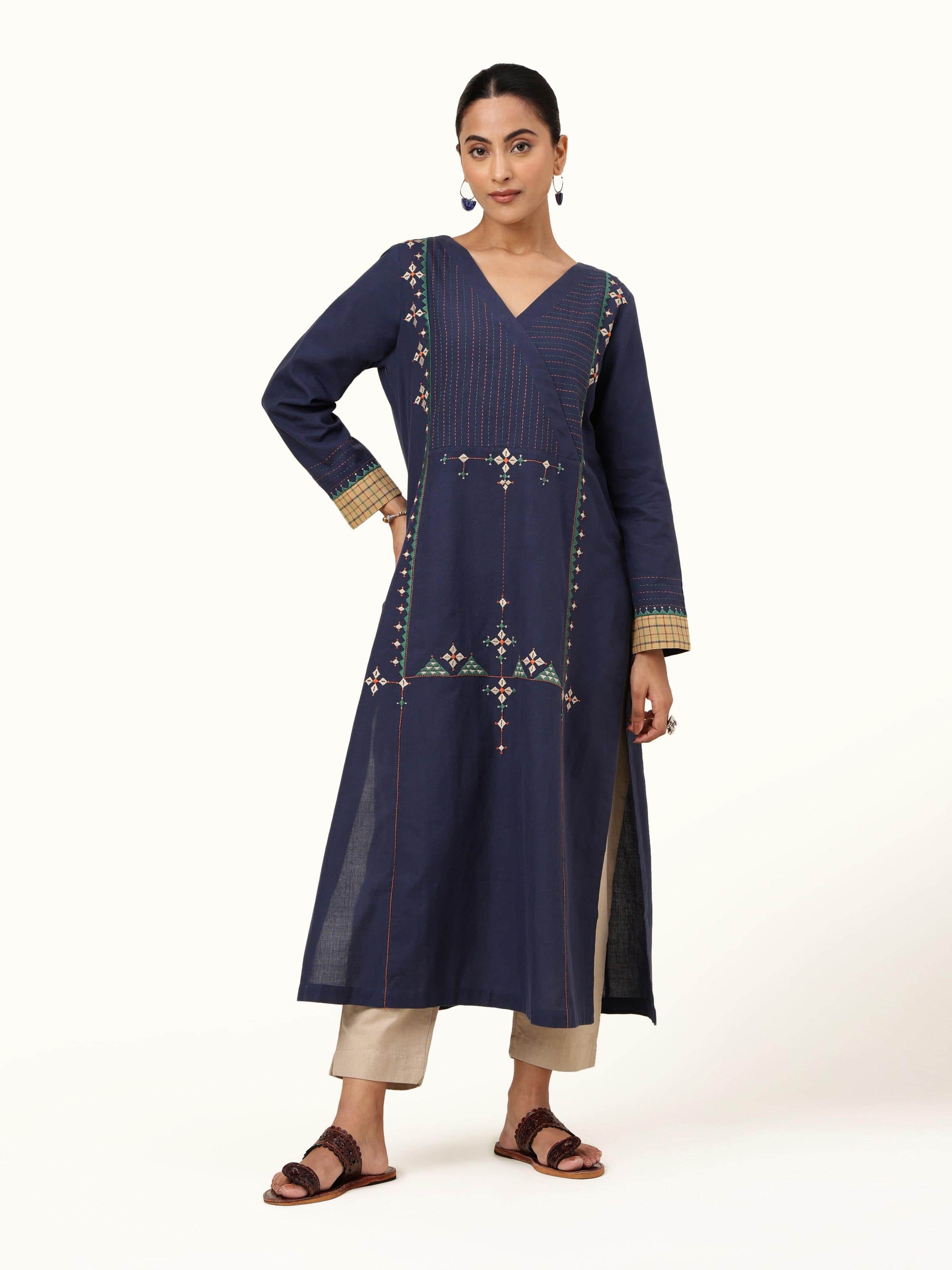 Front view of blue cotton kurta adorned with multicolor Rajasthani embroidery.