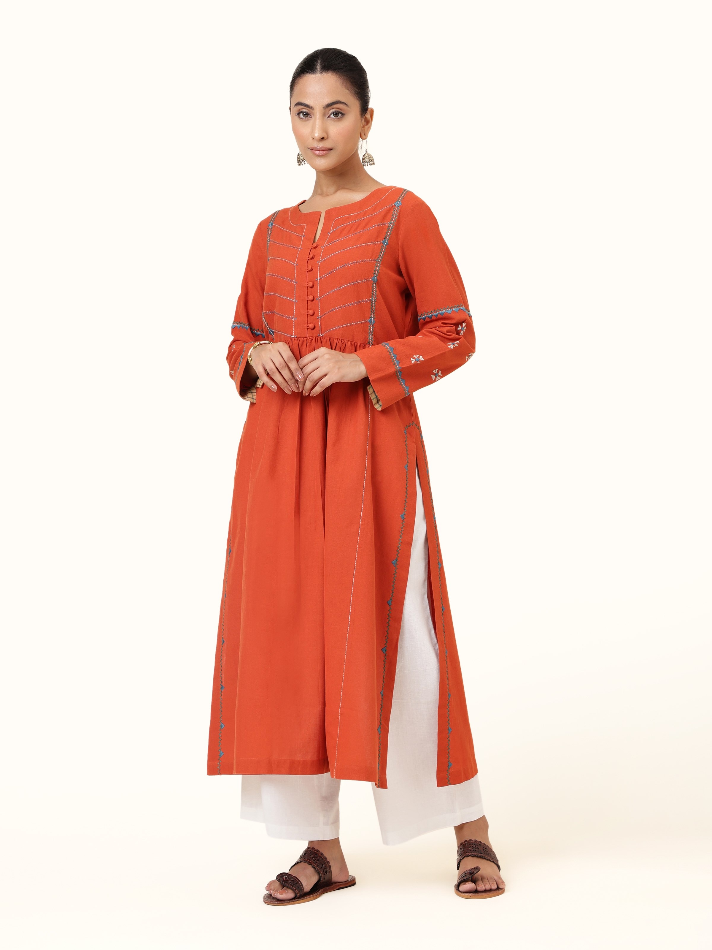 Front view of Rust Cotton Rajasthani Embroidered Kurta featuring warm rust cotton fabric with traditional Rajasthani embroidery.