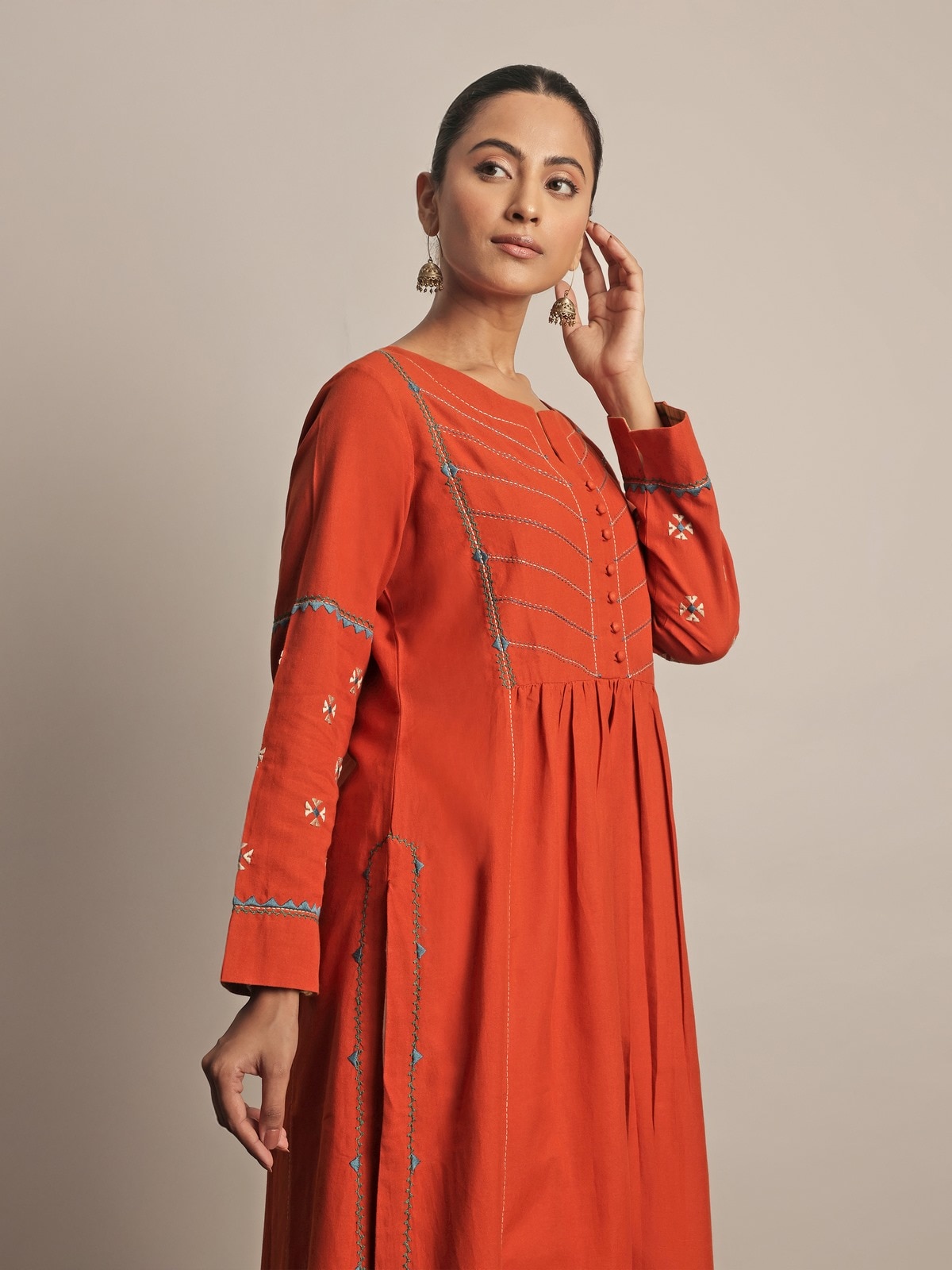 Close-up detail of Rust Cotton Rajasthani Embroidered Kurta emphasizing fine embroidery motifs and texture.