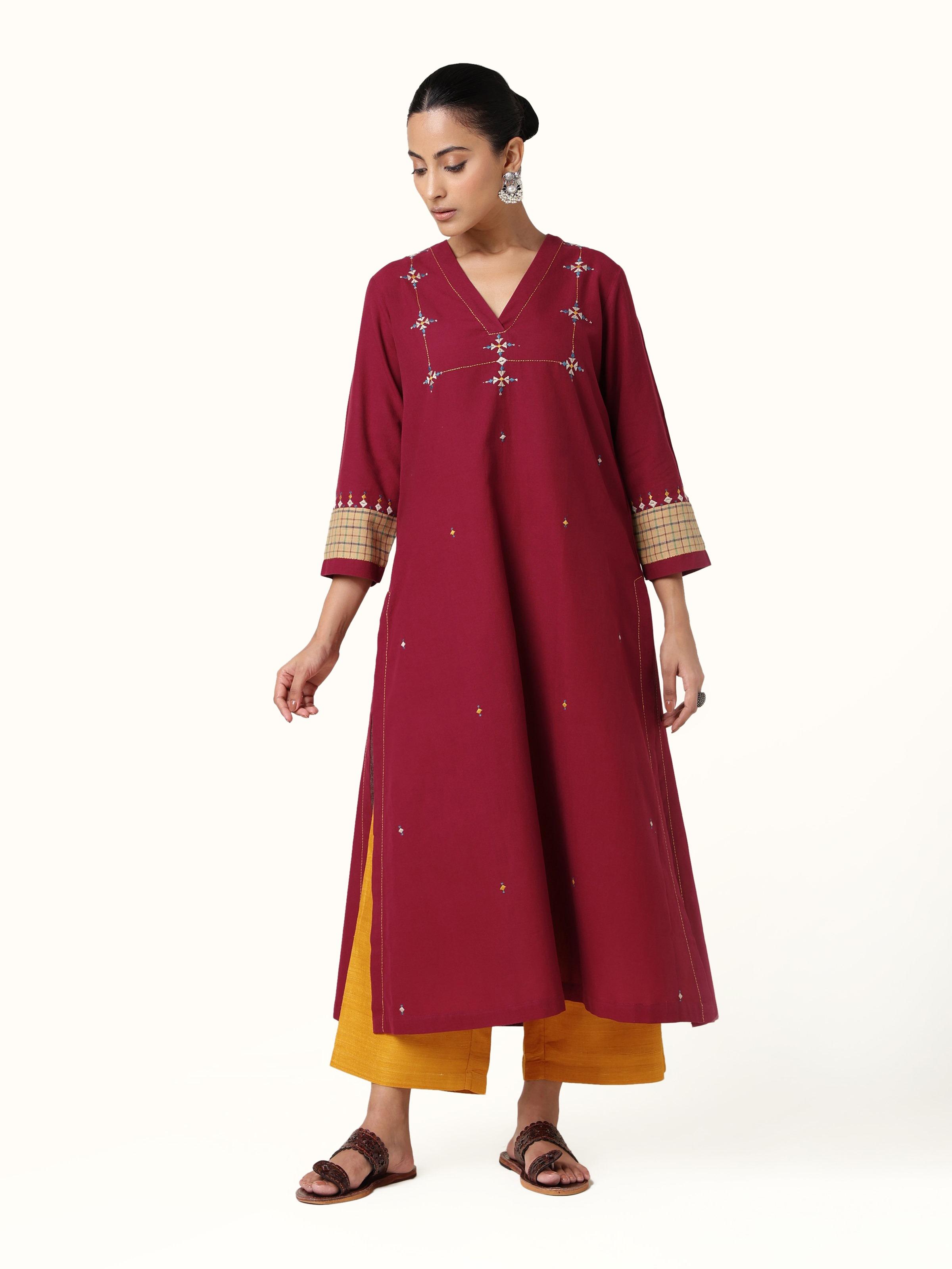 Front view of maroon cotton Rajasthani embroidered kurta with detailed floral patterns.