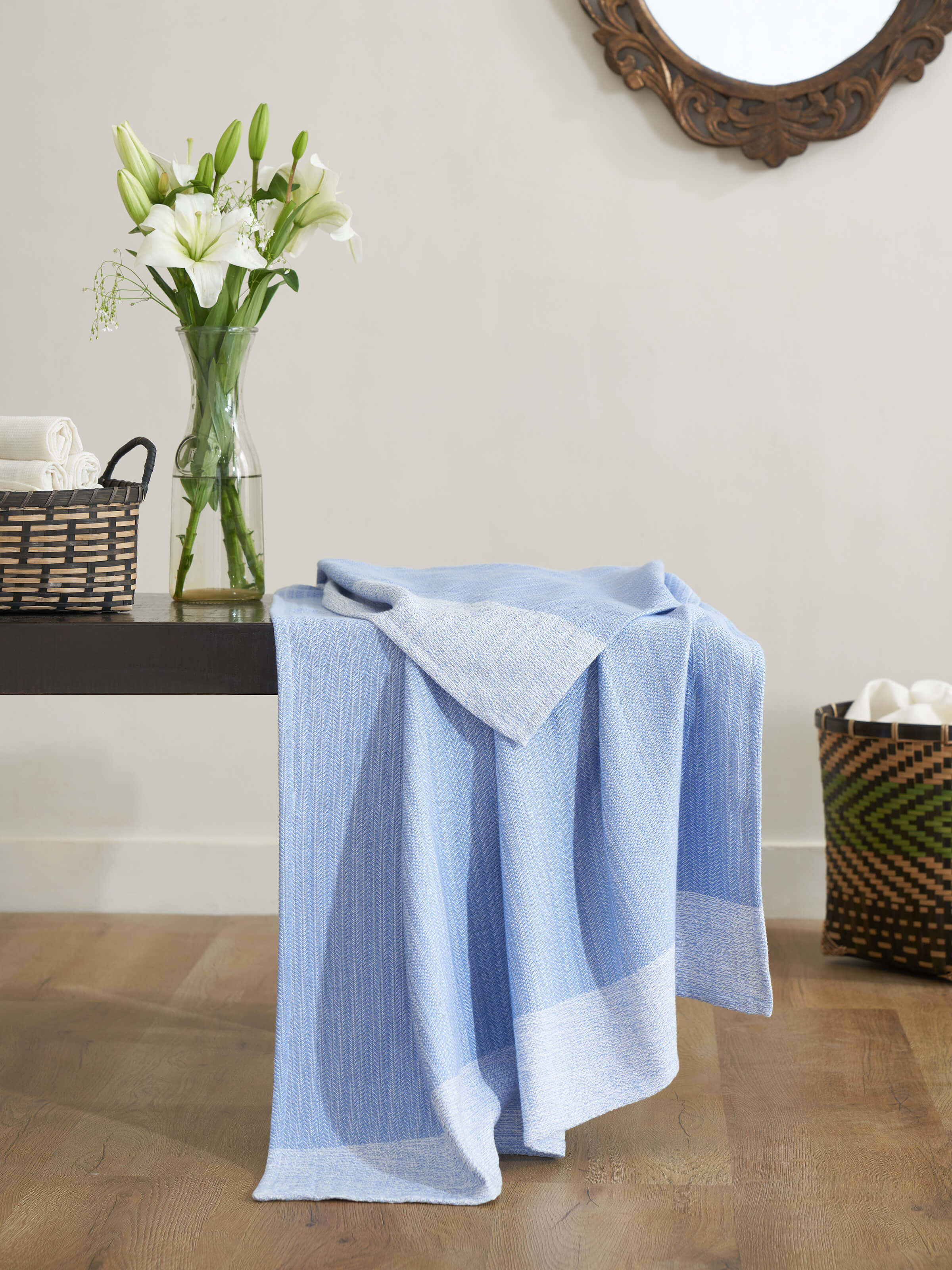 Close-up of the Vayana solid blue stripe cotton bath towel (XL), highlighting the rich blue stripe and fabric quality.