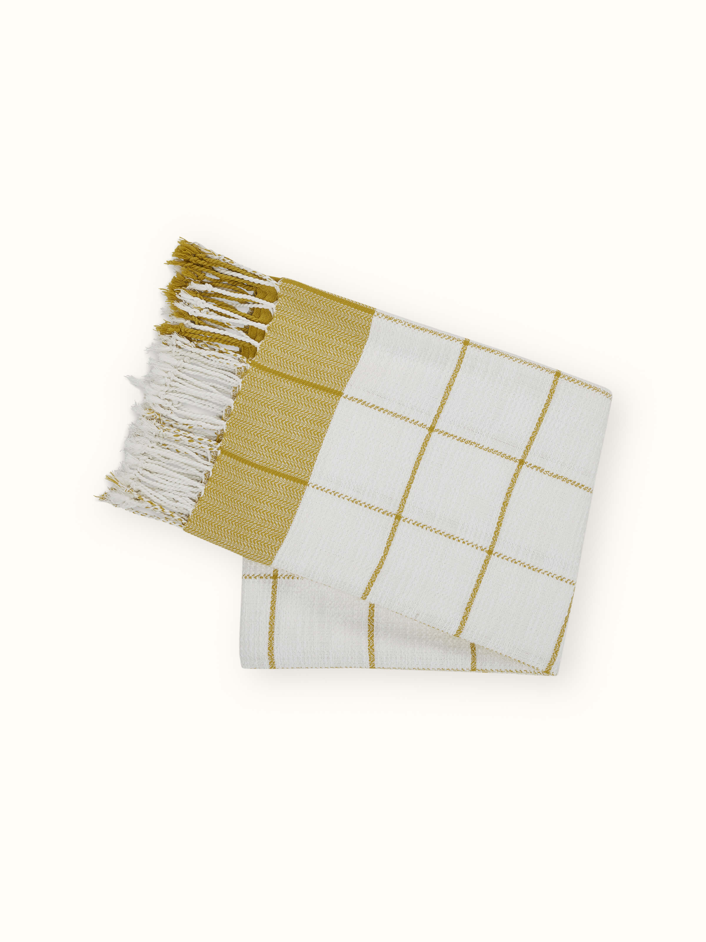 Back view of Adhima Ochre Throw, displaying clean edges and fine finish of the handwoven cotton.