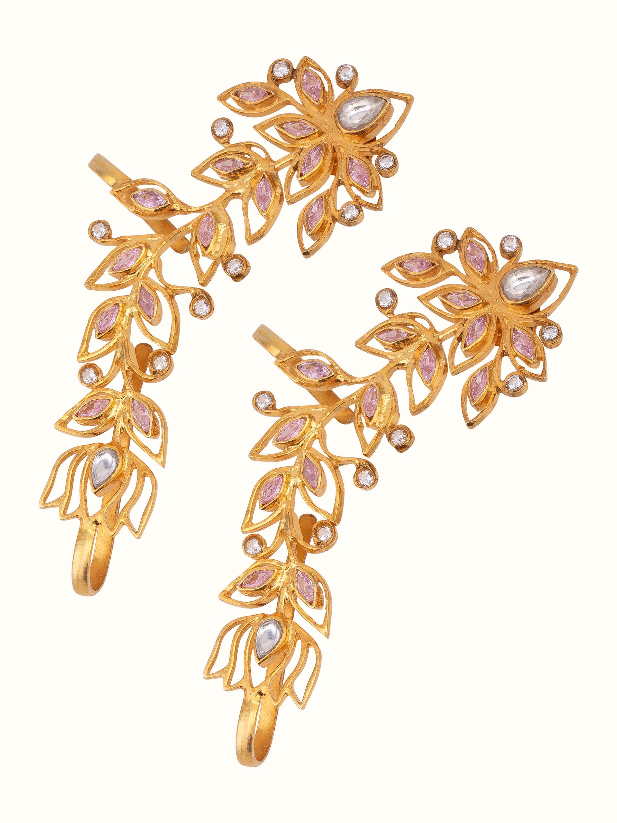 Detailed view of silver smithing ear cuffs showcasing intricate design and quality craftsmanship.