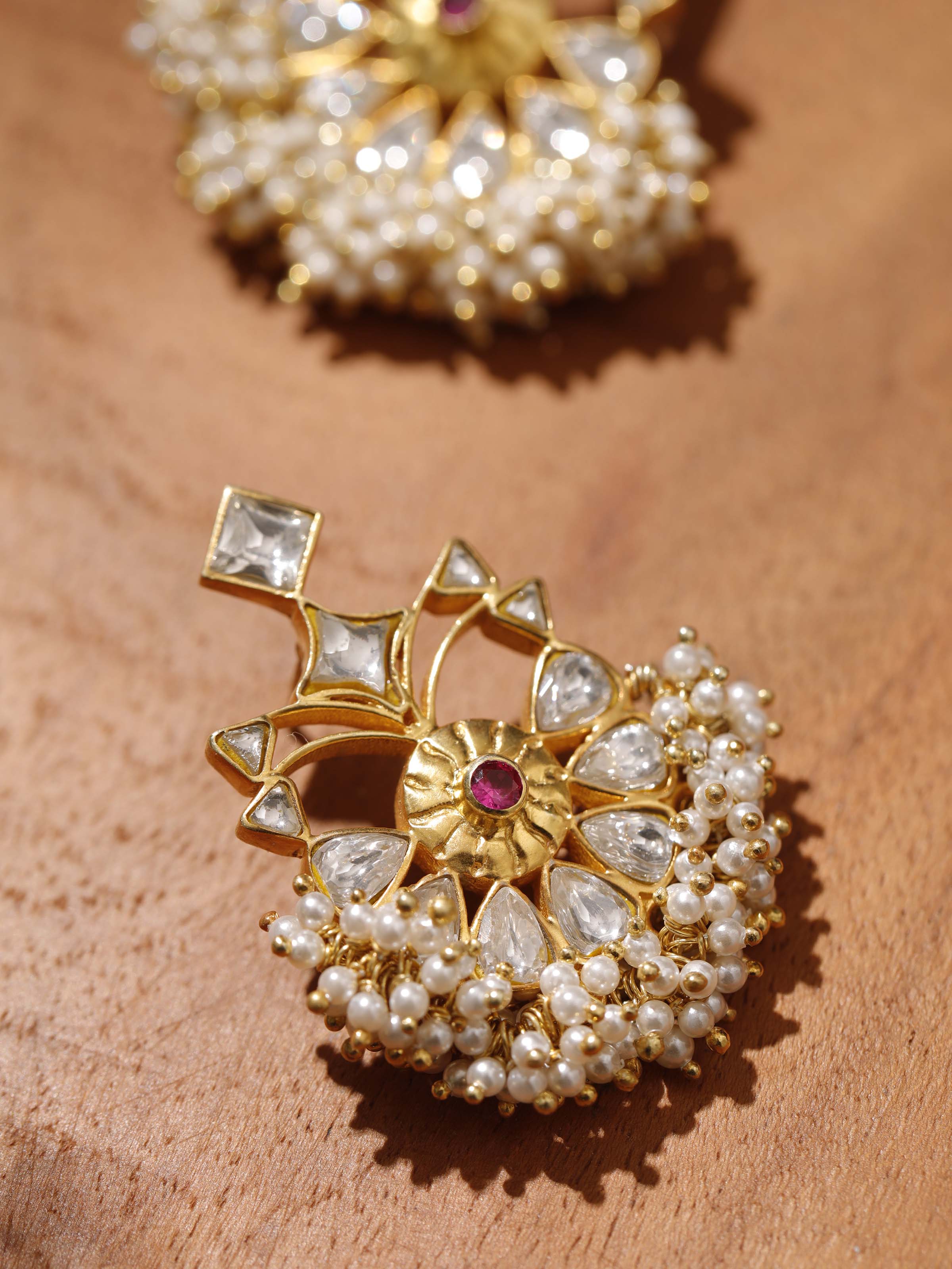 Detail shot highlighting the craftsmanship and texture of the silver surface