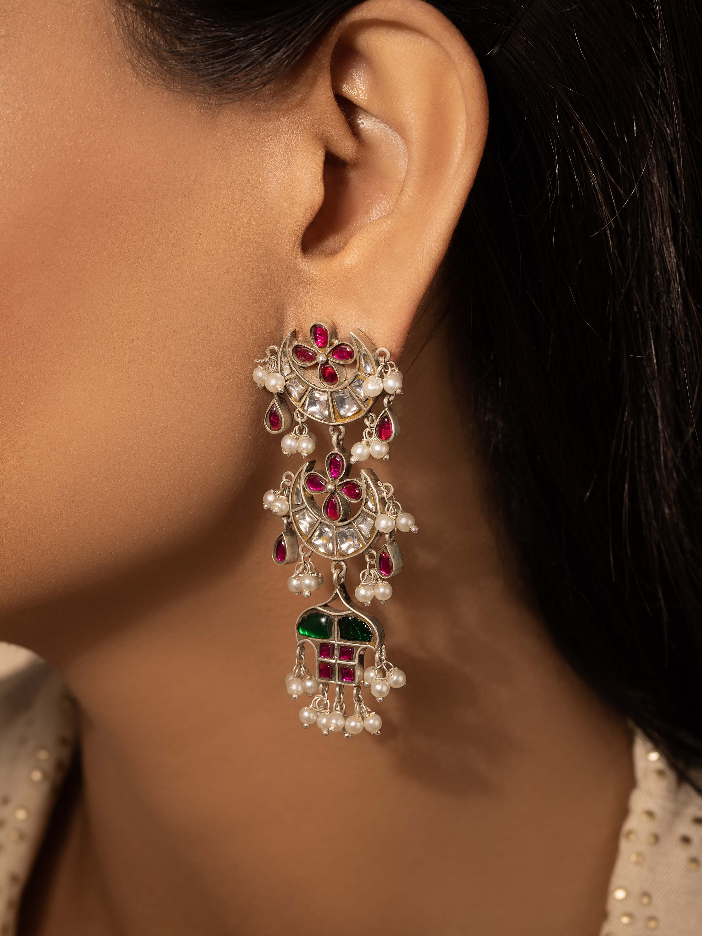 Side view of Silver Smithing Drop Earrings displaying the elegant drop design.