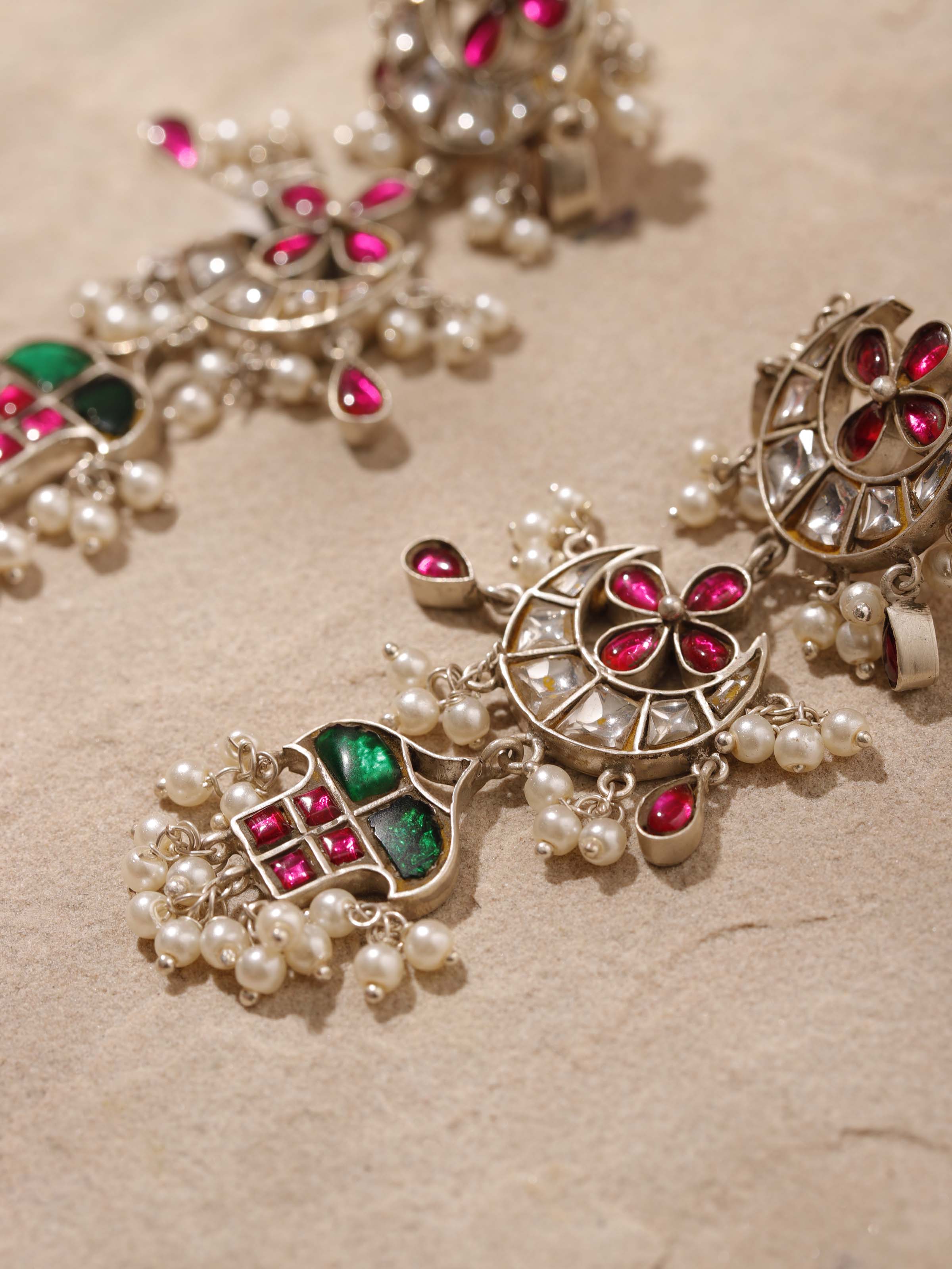 Detailed view of Silver Smithing Drop Earrings focusing on intricate silverwork and design.