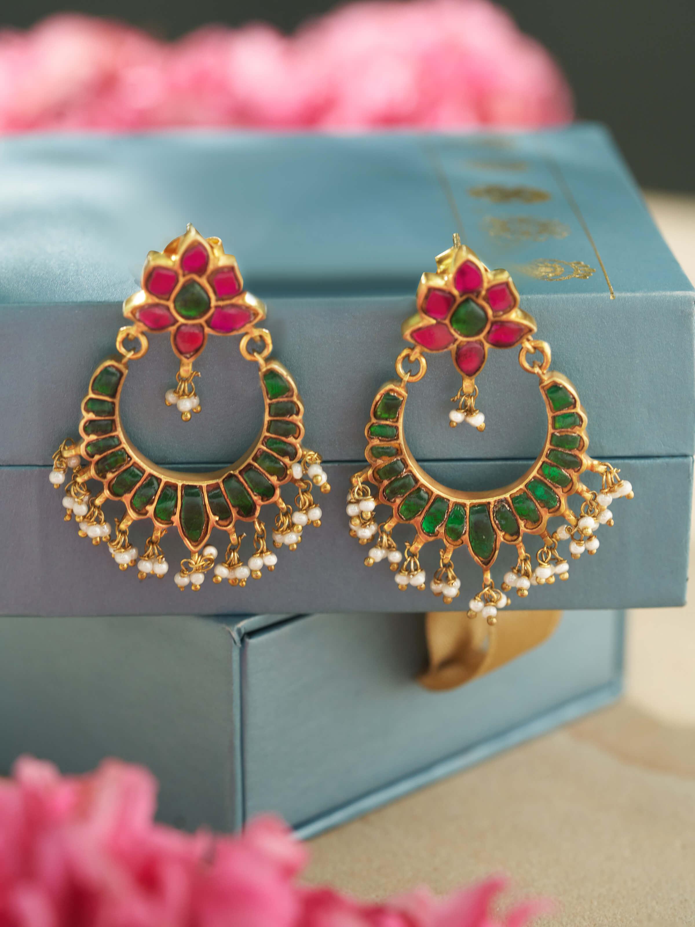 Lifestyle view of Silver Smithing Chandbalis styled with hair tied back to reveal the design.