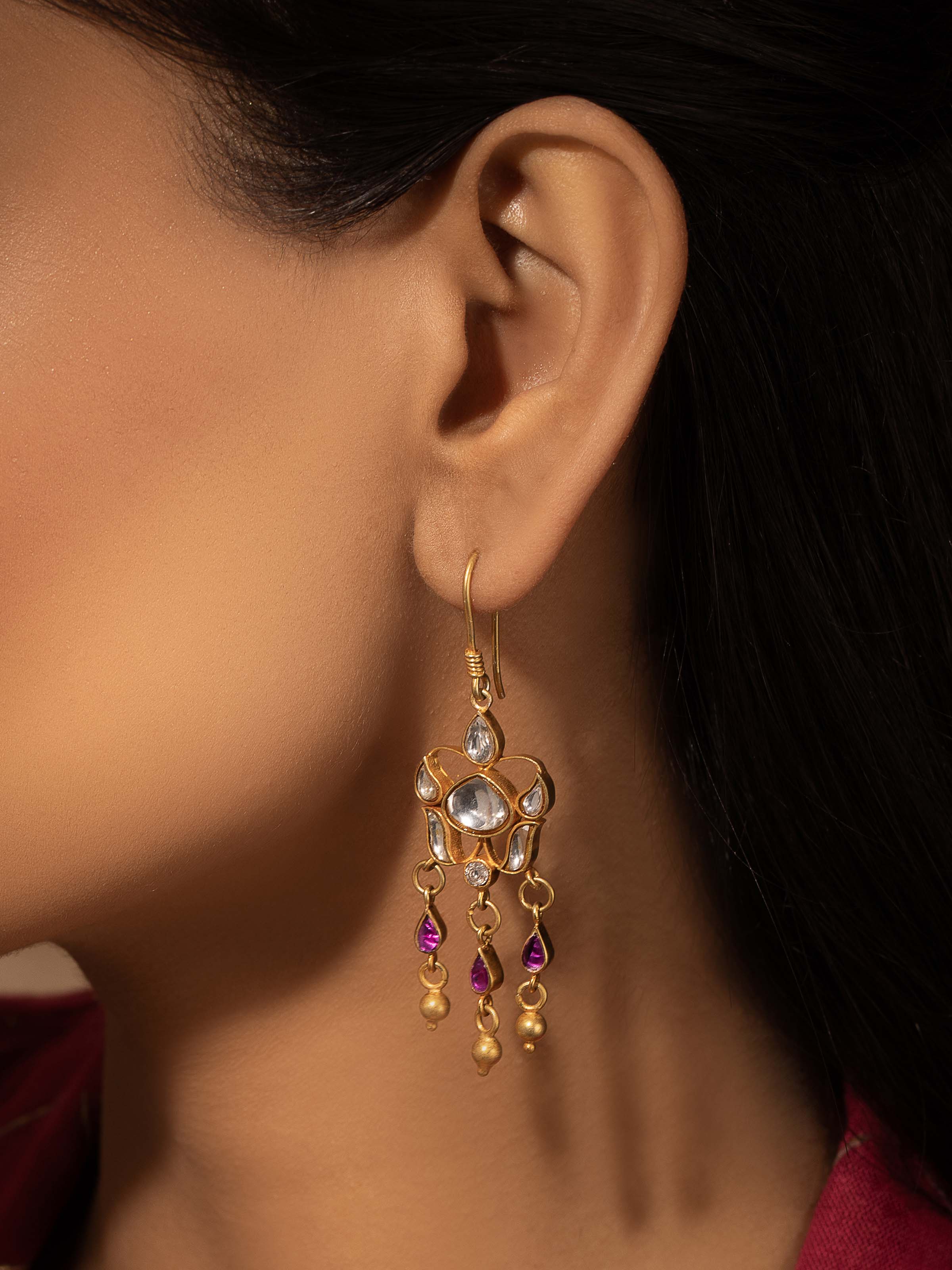 Side view of Silver Smithing Drop Earrings showcasing the refined silver work and elegant design.