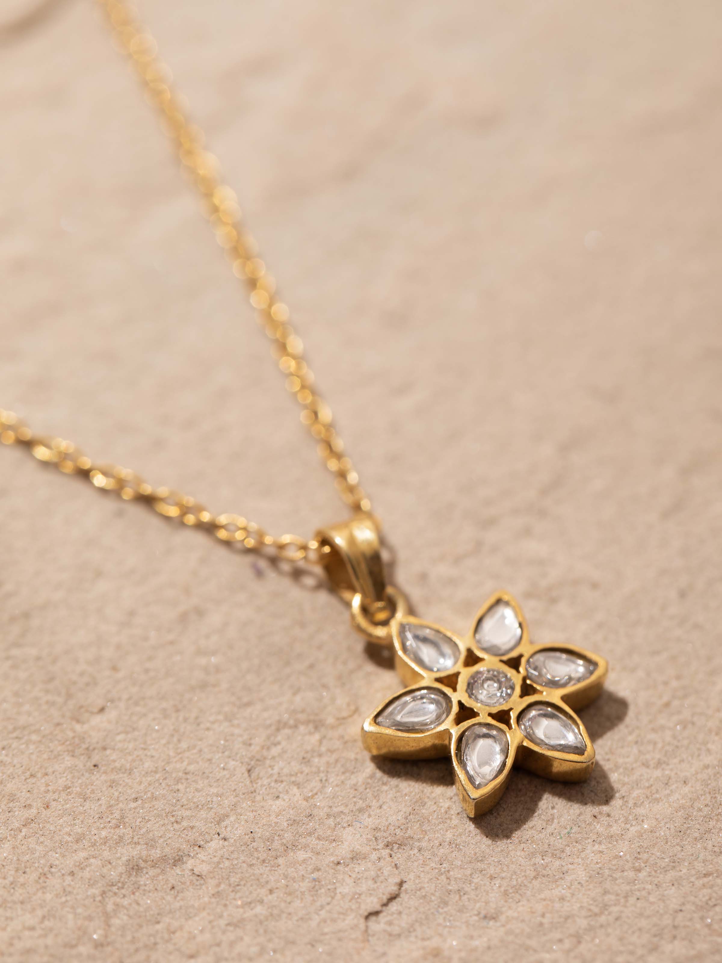 Angled view of Silver Smithing Pendant & Chain displaying the pendant's elegance and the chain's sleek design