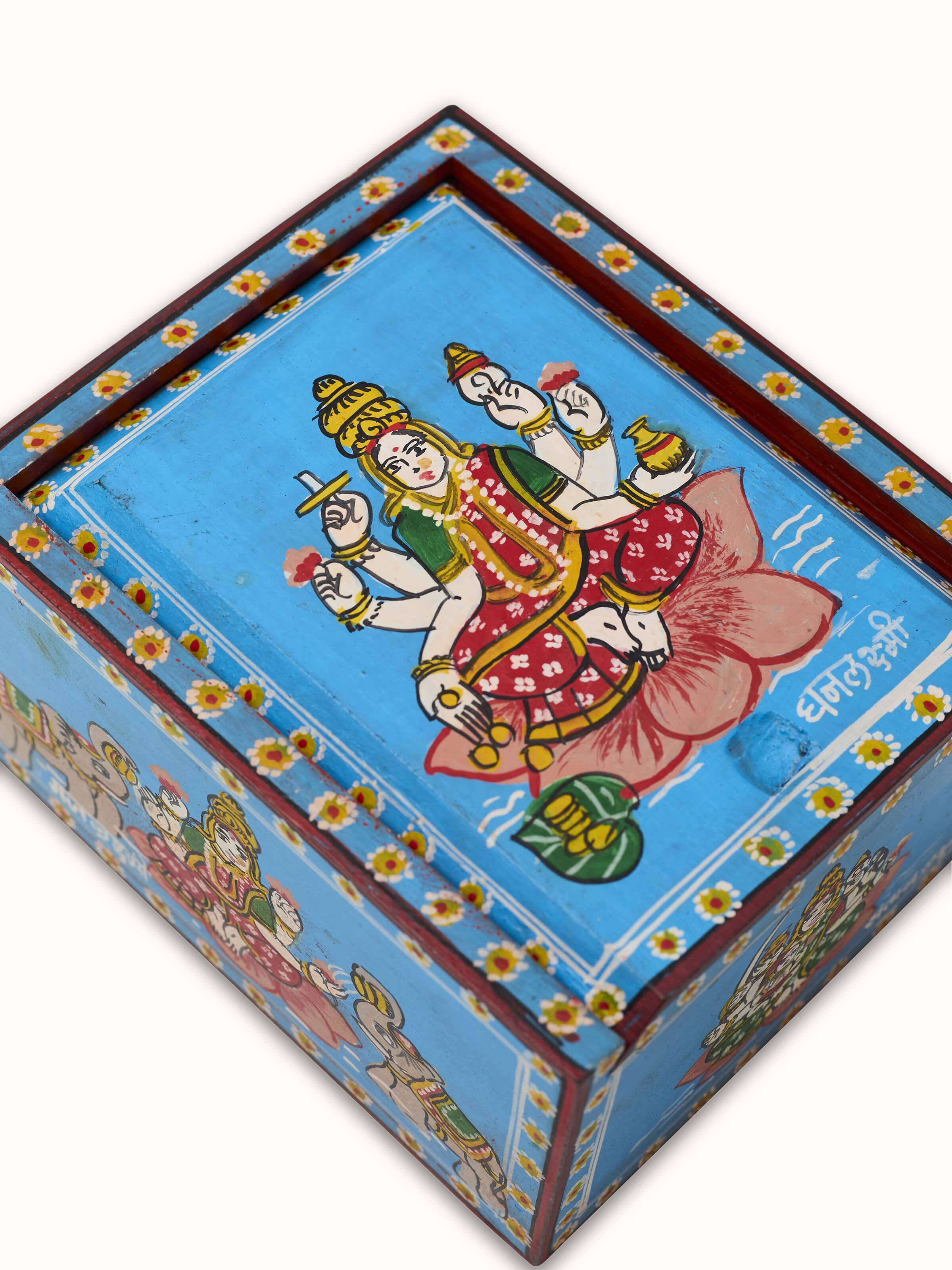 Close-up of Ganjifa paper cards blue set (108 pcs) with focus on intricate details and textures