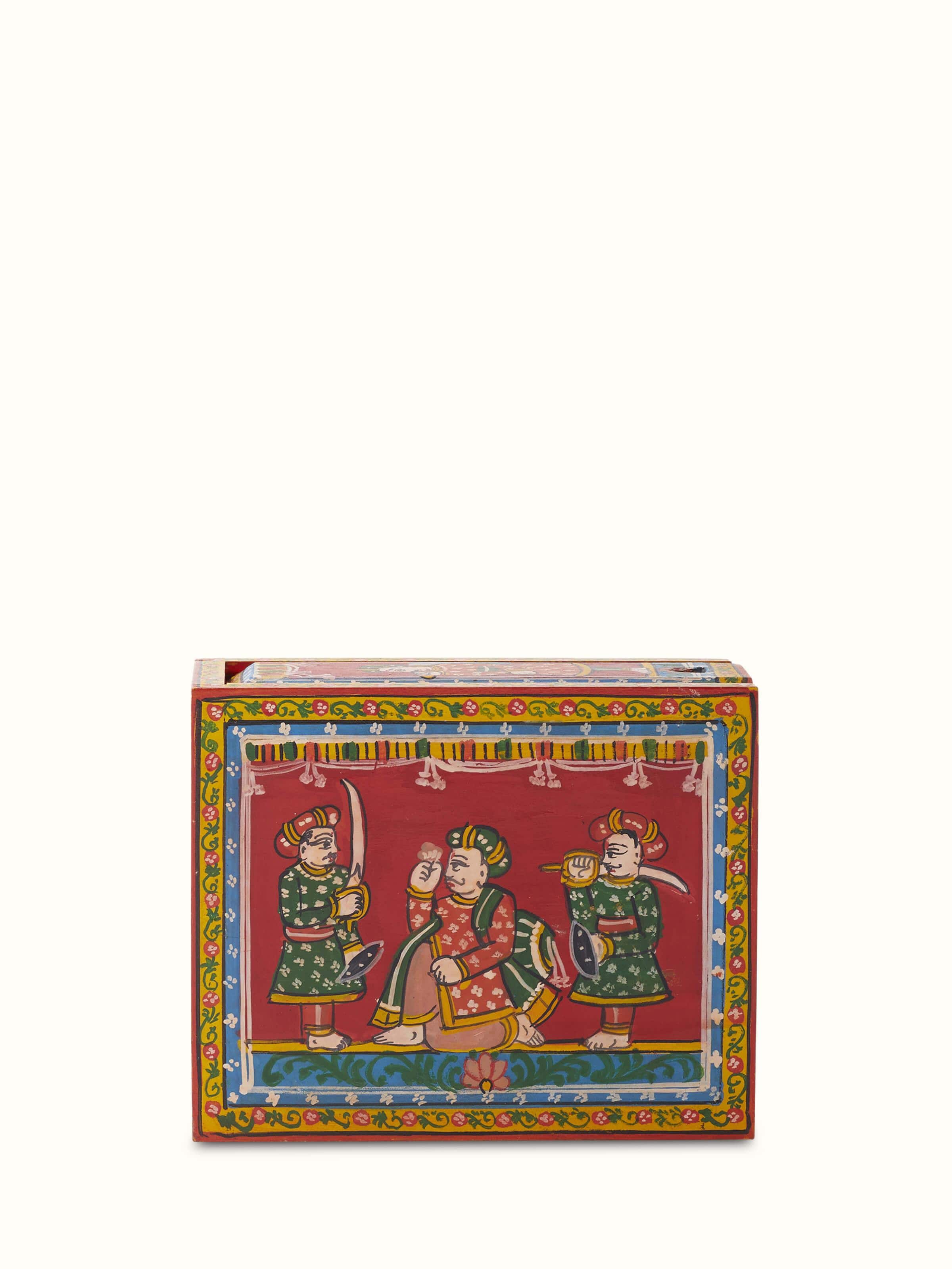 Packaged view of Ganjifa paper cards in red color (54 pcs) with visible design patterns
