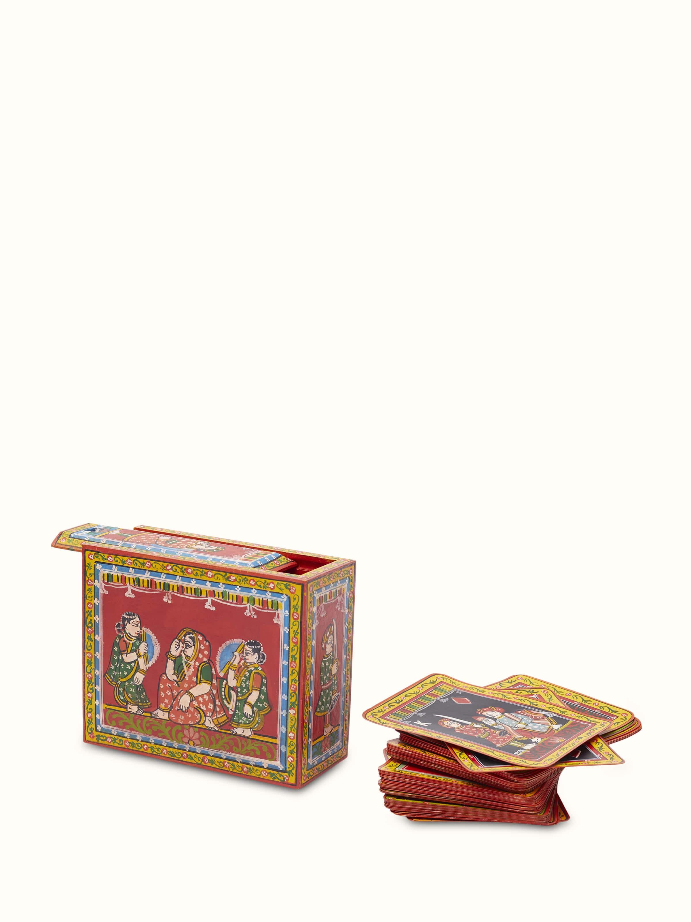 Front view of Ganjifa paper cards in red color (54 pcs) displaying traditional design