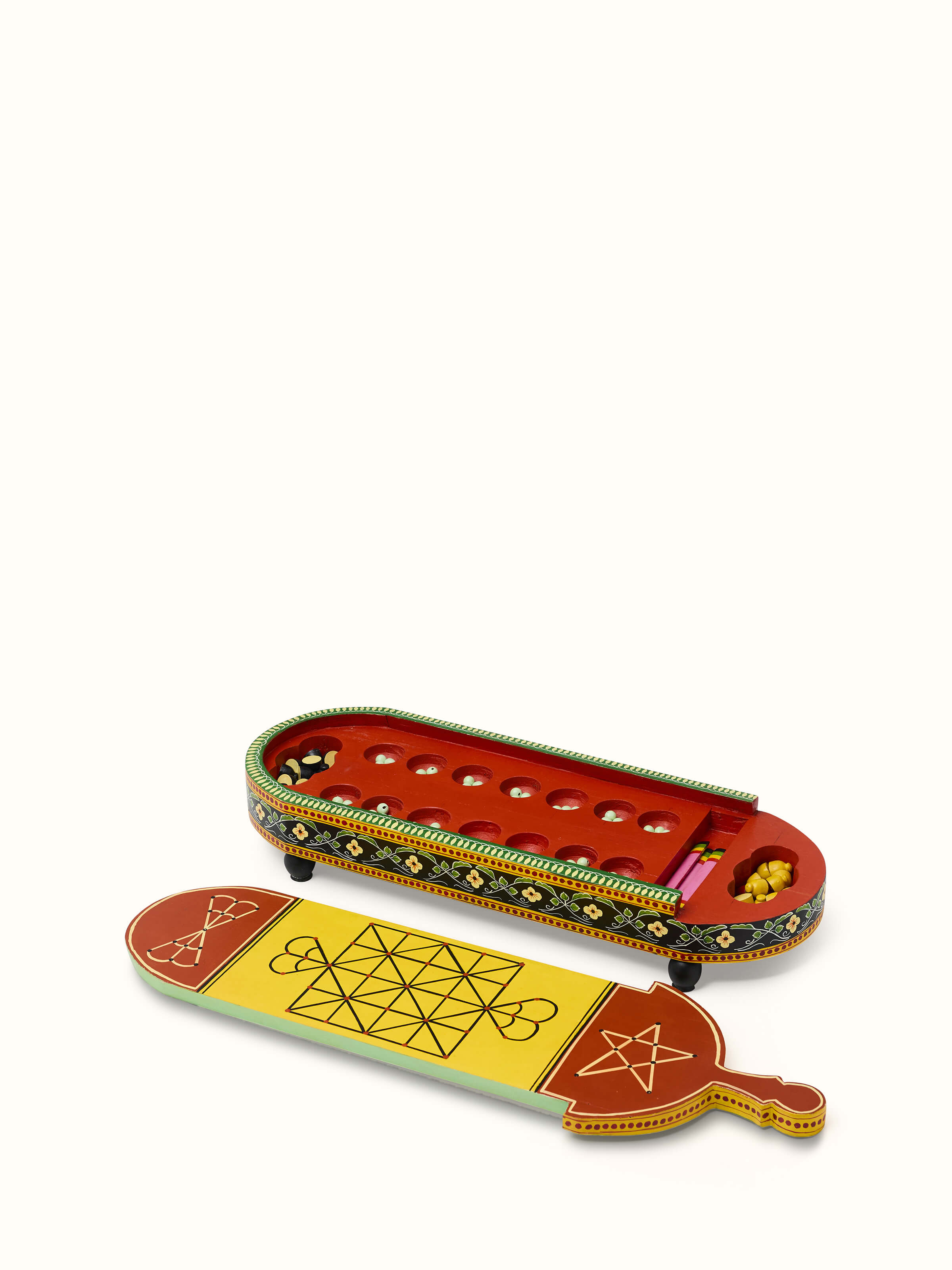 Top view of Ganjifa cedar wood 6-in-1 board game in red displaying the variety of game pieces