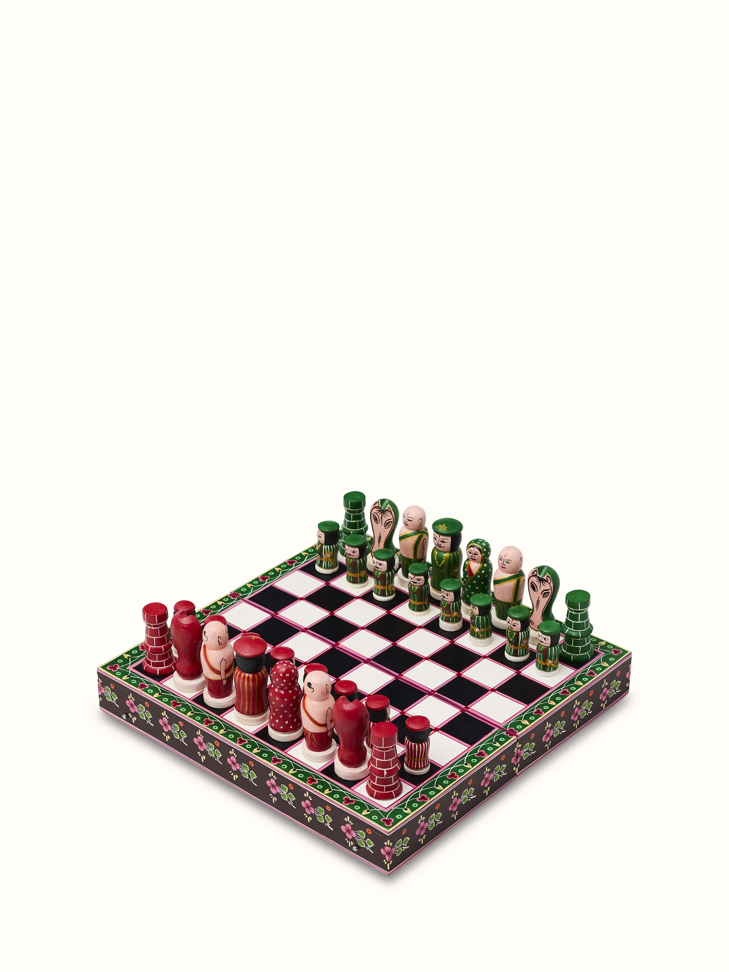 Close-up view of Ganjifa Cedar Wood Chess Set revealing detailed carving on the chess pieces.