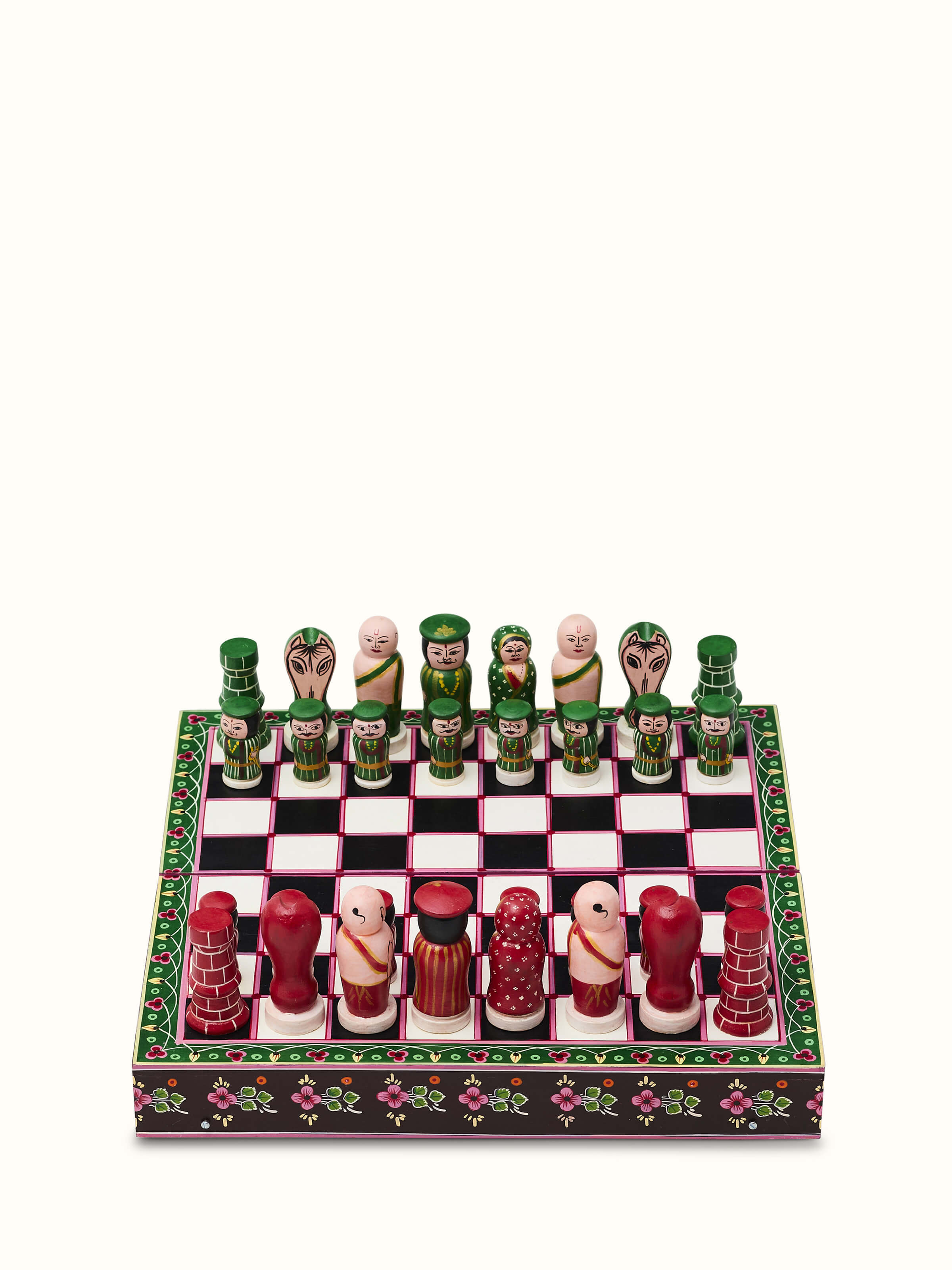 Close-up view of Ganjifa Cedar Wood Chess Set showcasing unique chess piece designs and details.