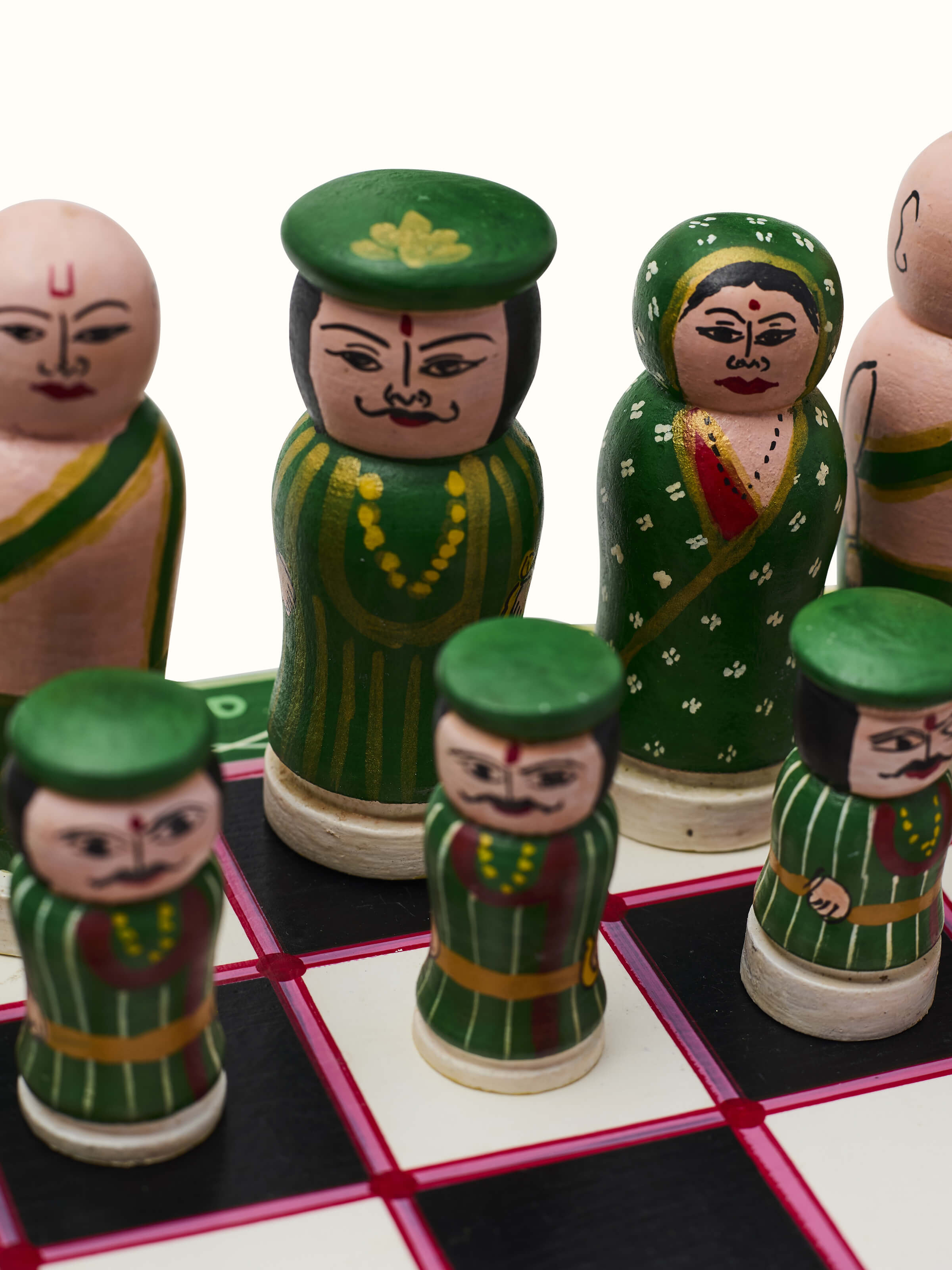 Detailed view of Ganjifa Cedar Wood Chess Set highlighting the intricate woodwork and craftsmanship.