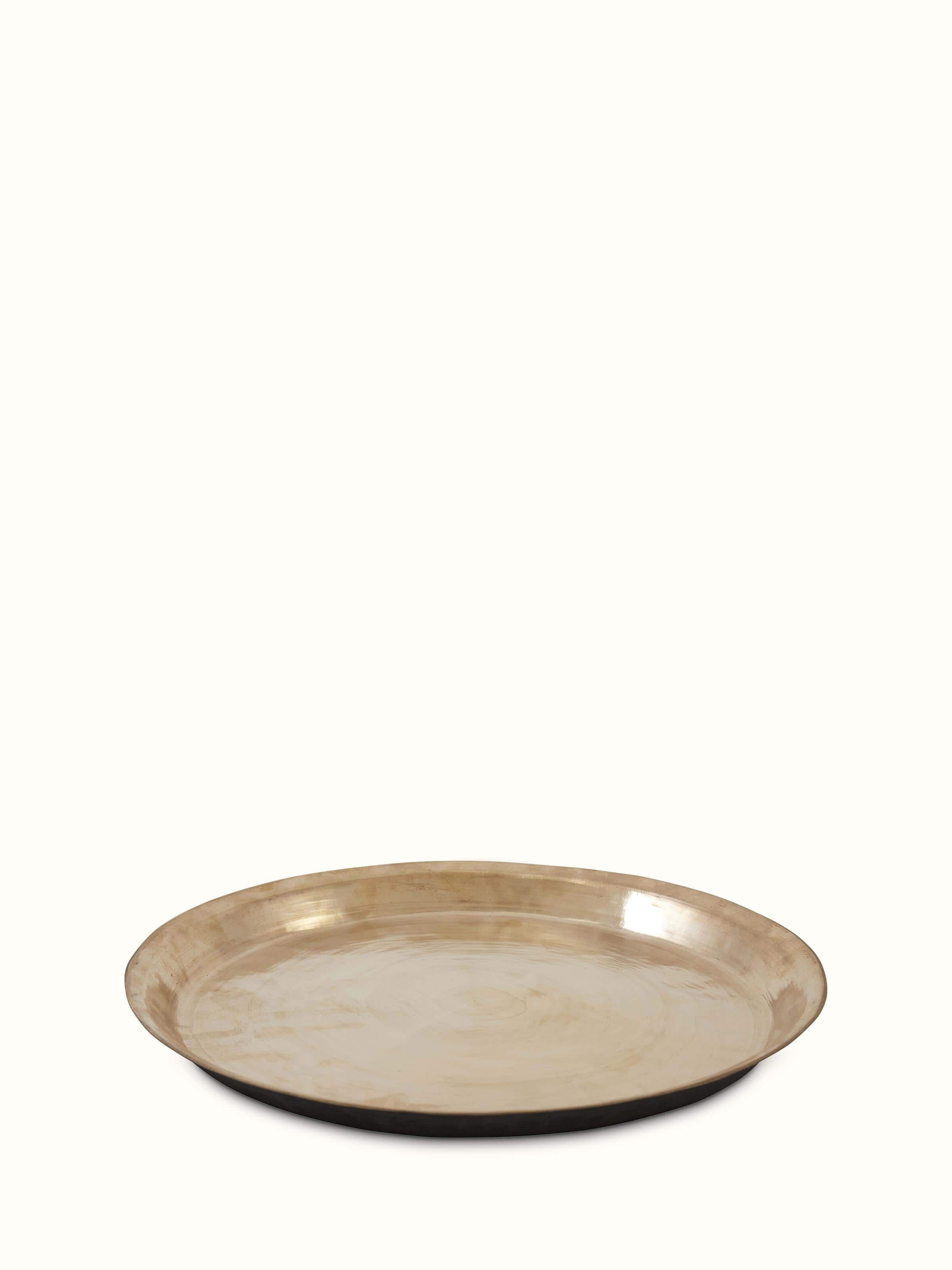 Side view of bell metal Balisiri dinner plate emphasizing the depth and curvature of the plate