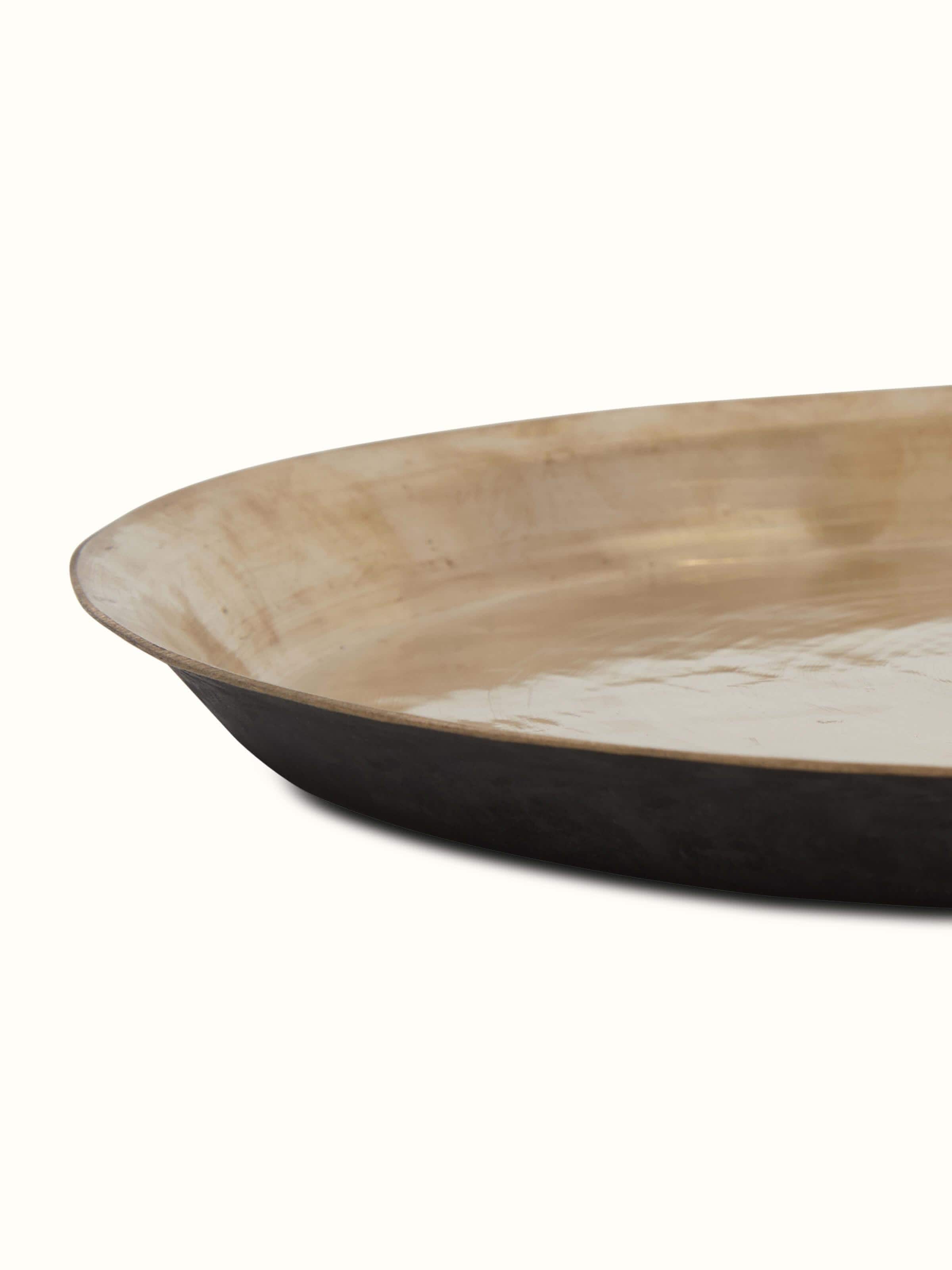 Detailed close-up of bell metal Balisiri dinner plate showcasing intricate patterns and high-quality finish