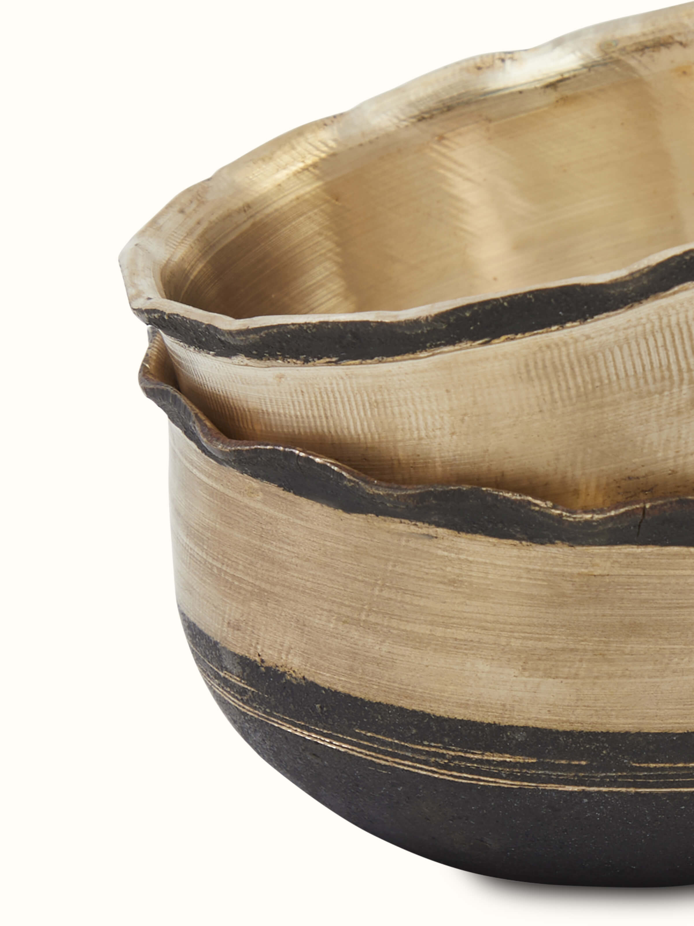Close-up view of Bell metal pinchha dinner bowl focusing on traditional patterns