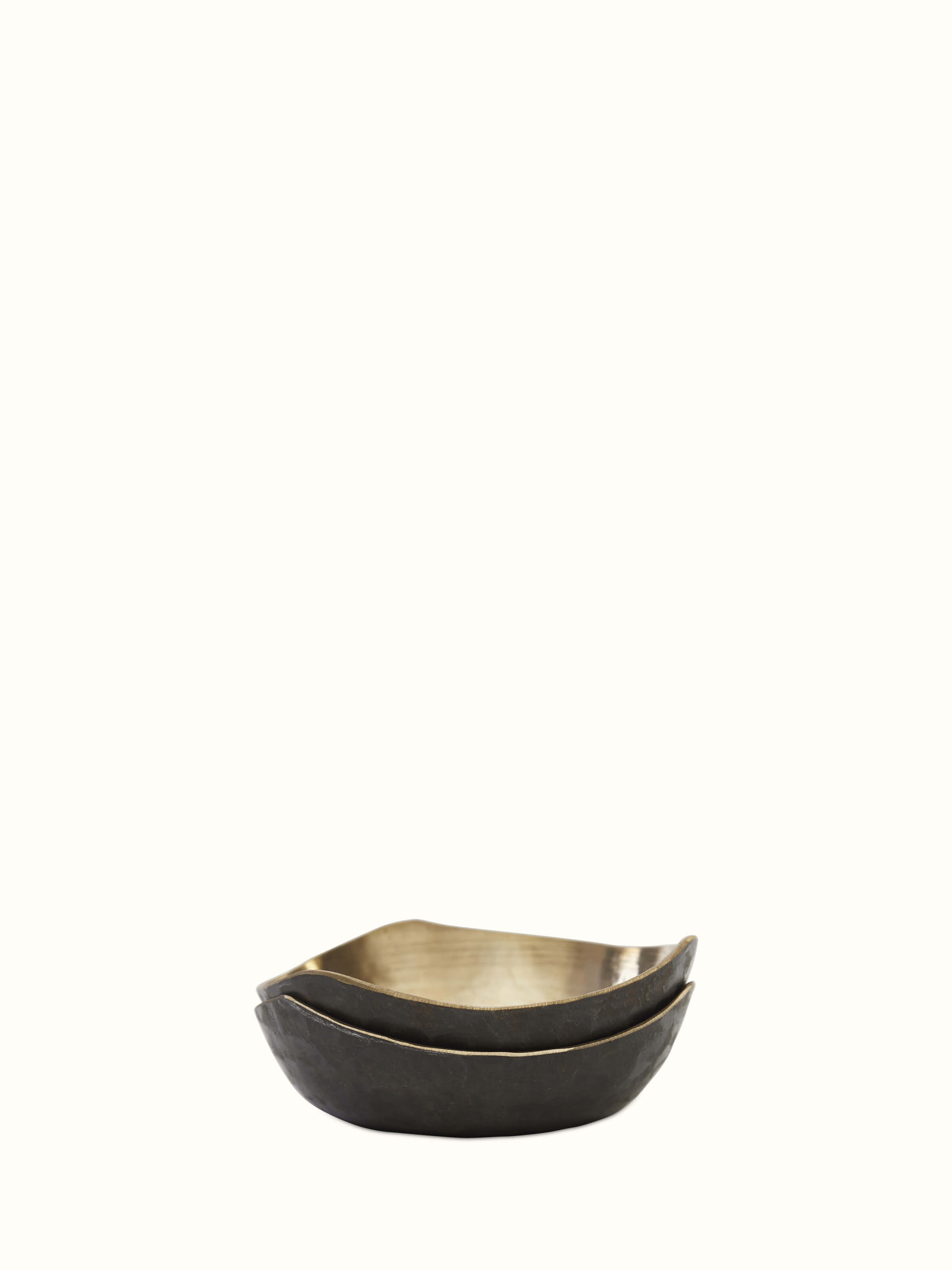 Front view of Bell metal triangular dinner bowl highlighting its unique triangular shape and polished metal finish