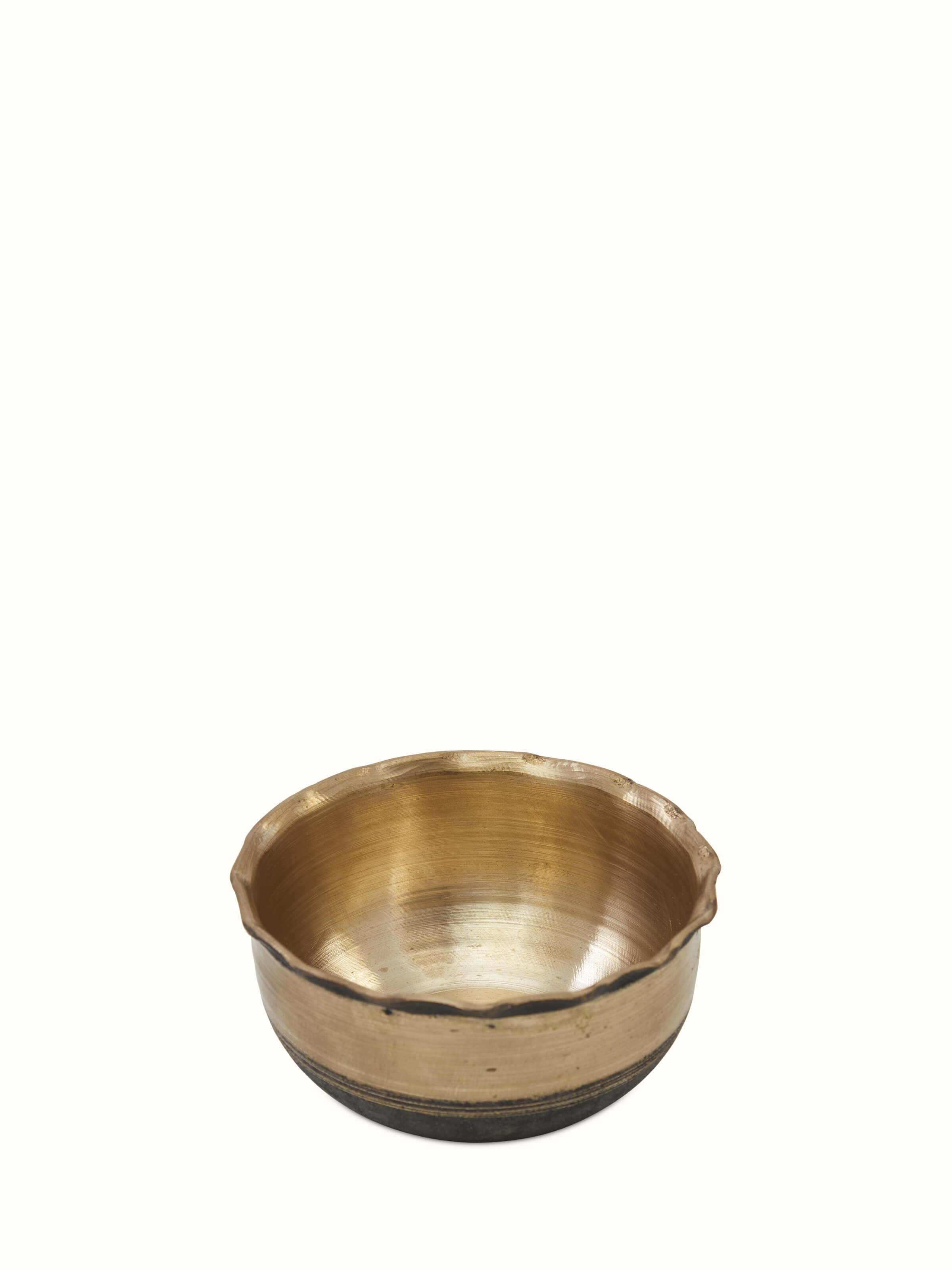 Angled view of Bell Metal Bela Dinner Bowl highlighting the craftsmanship and reflective quality of the metal