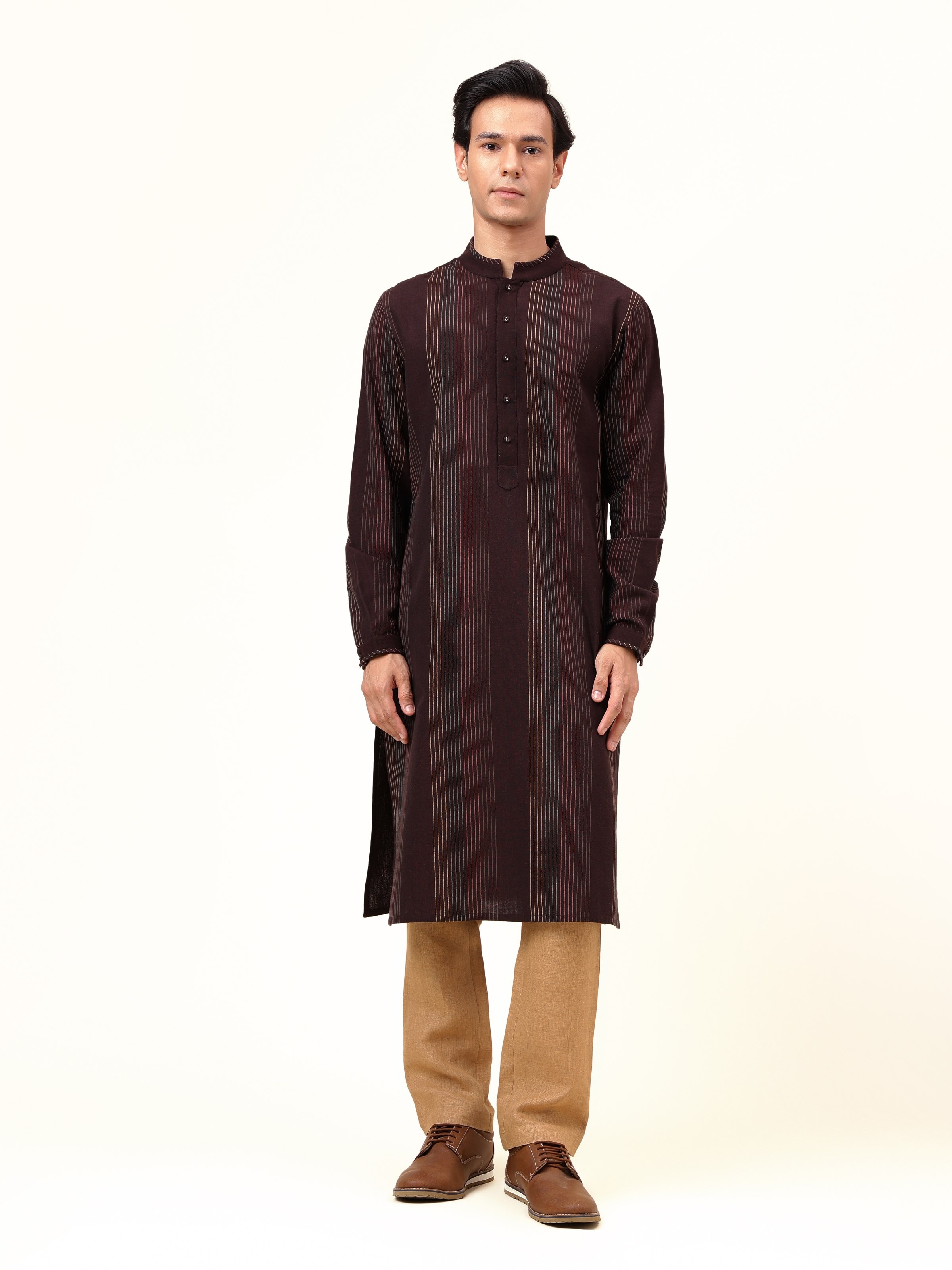 Front view of the earthy brown cotton kurta with striking extra-weft stripes, lending an artisanal touch.
