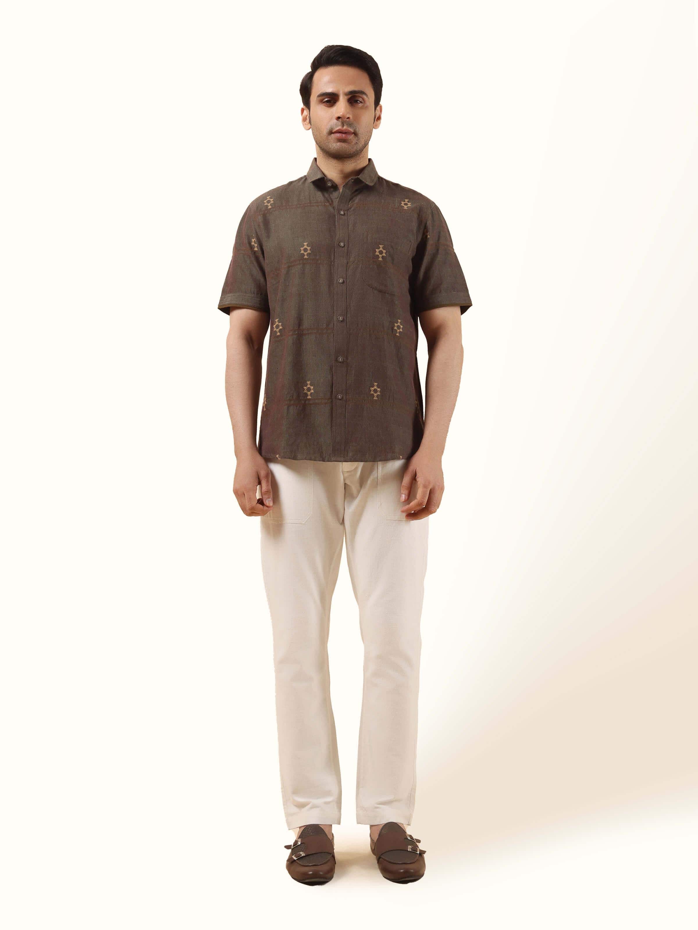Front view of brown cotton extra-weft shirt featuring textured weave and mandarin collar.