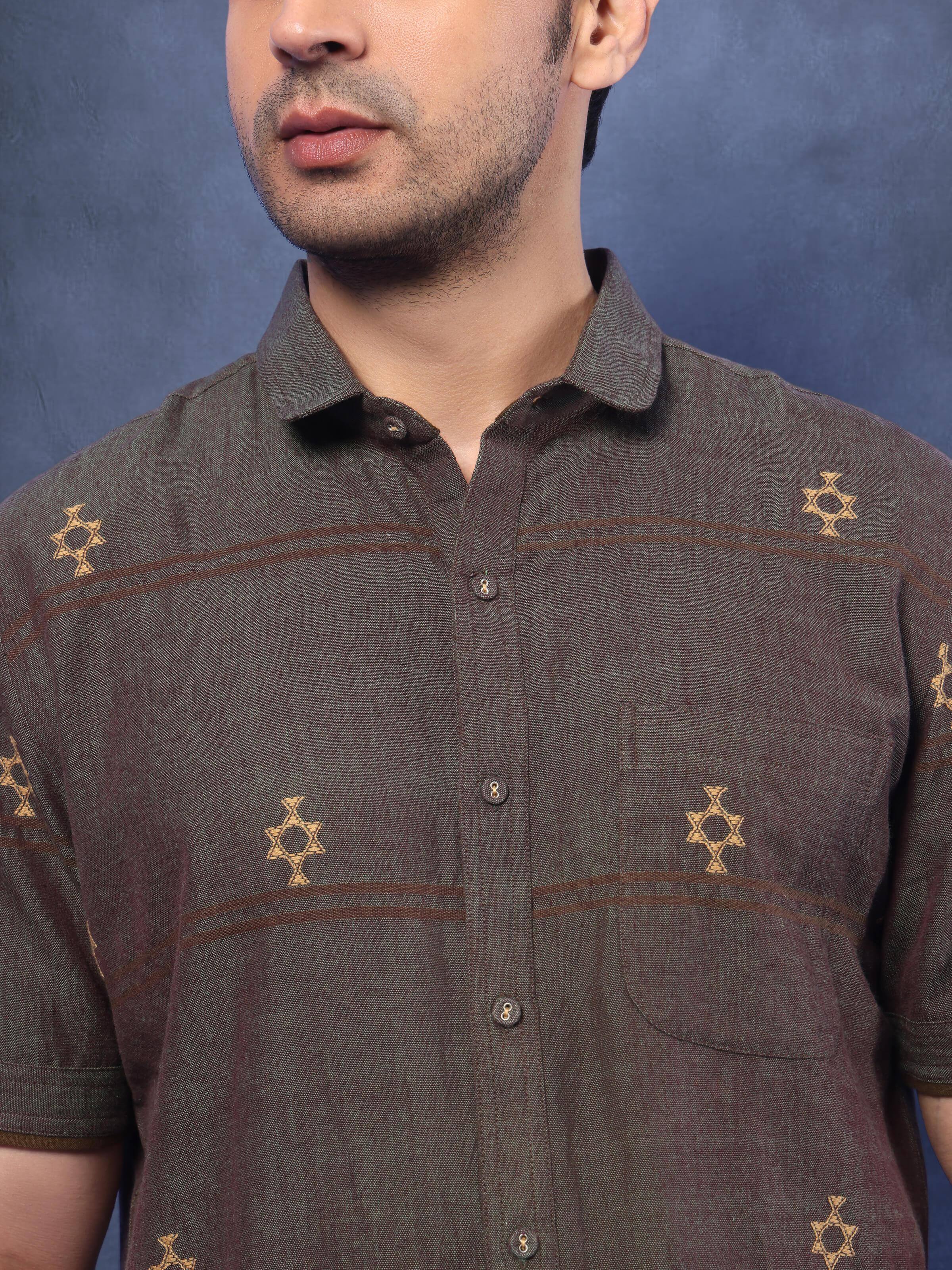 Detail shot of brown cotton shirt highlighting the textured extra-weft weaving.