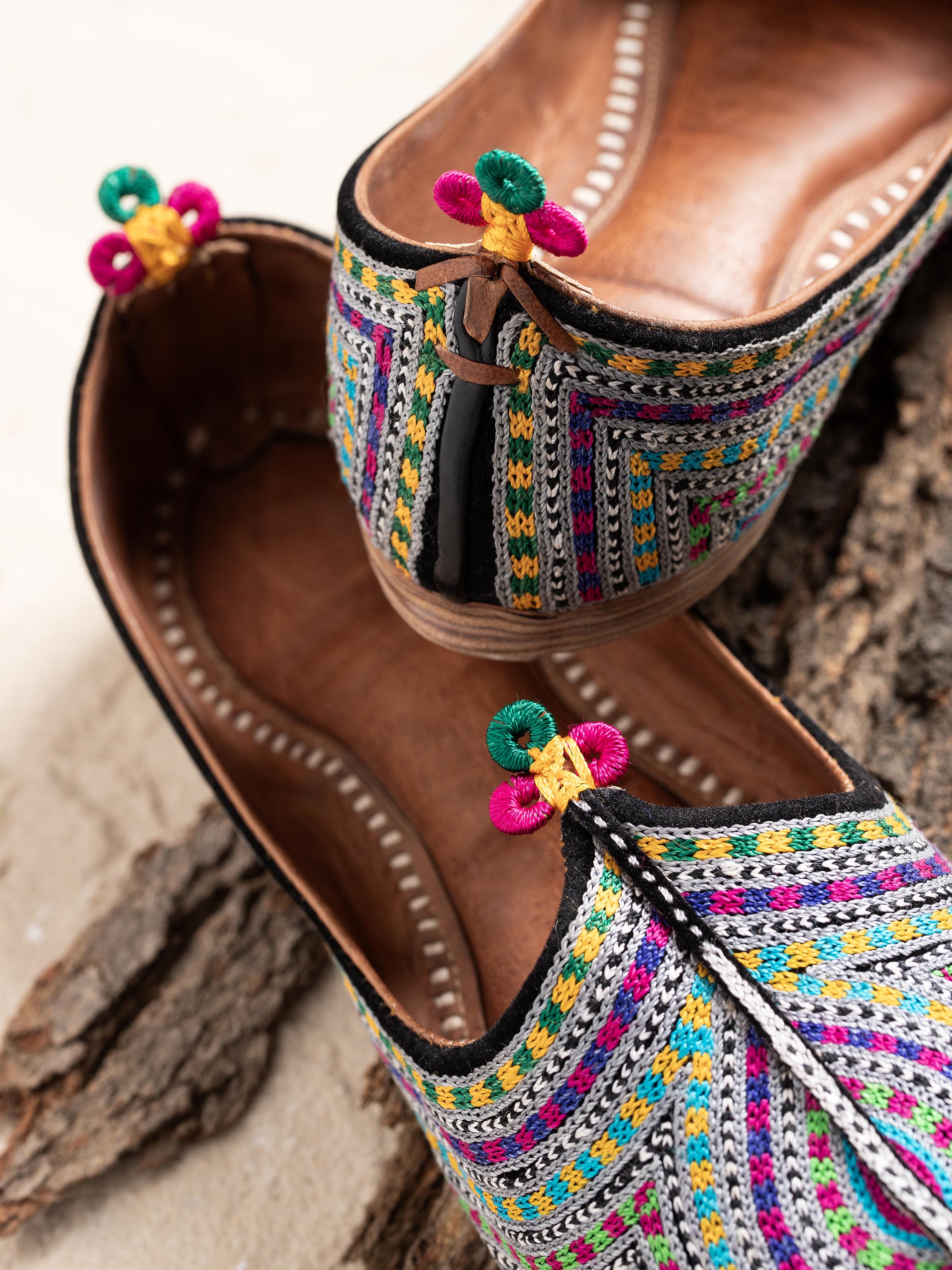 Close-up of multicolor leather embroidered Jodhpuri pagrakha highlighting stitching details