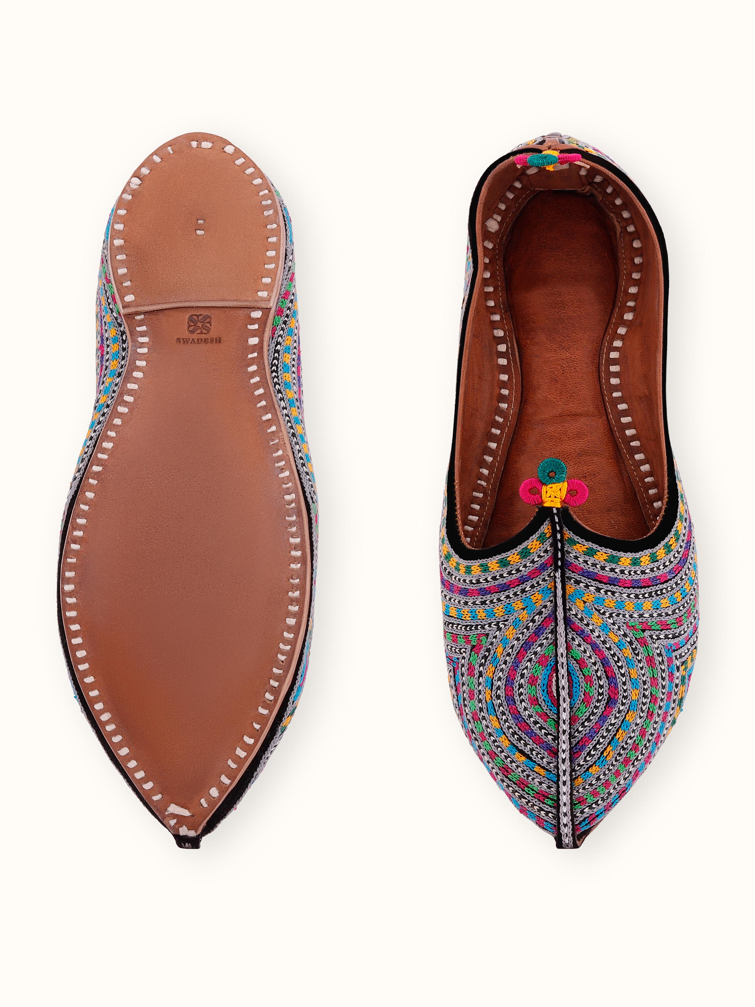 Detailed view of the multicolor leather embroidered Jodhpuri pagrakha with focus on embroidery patterns